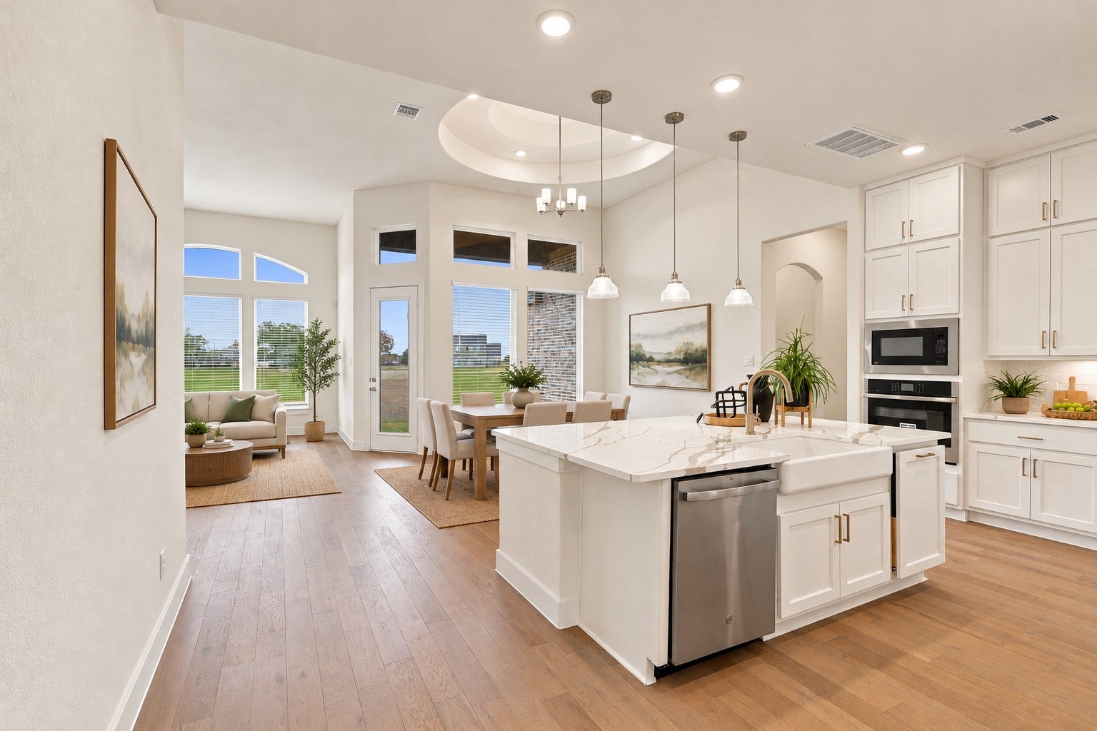 1051 Lakeland Circle, Rosharon, TX 77583 WHAT A TIMELESS OPEN FLOOR PLAN! This STUNNING GOURMET KITCHEN is designed for STYLE, COMFORT & EVERYDAY CONVENIENCE! Notice the BEAUTIFUL DEEP FARMHOUSE SINK and CLEVER PULL-OUT TRASH CABINET that keeps everything neatly tucked away! The SPECTACULAR OPEN DESIGN flows effortlessly into the living and dining areas, making entertaining a BREEZE! A WONDERFUL SPACE for gathering homemade cooking & creating lasting memories! Photo is Virtually Staged.