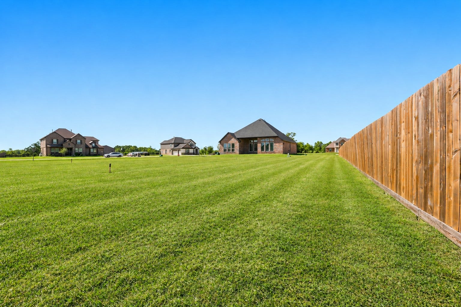 1051 Lakeland Circle, Rosharon, TX 77583 YOUR OWN BACKYARD PARADISE AWAITS! Just LOOK at that EXPANSIVE GREEN LAWN stretching along the side & rear of this BEAUTIFUL HOME! Imagine the ENDLESS POSSIBILITIES for outdoor entertaining, gardening, or simply enjoying all that WONDERFUL OPEN SPACE! Notice the UPGRADED ALL-BRICK EXTERIOR ON ALL FOUR SIDES, offering TIMELESS BEAUTY & LESS EXTERIOR UPKEEP! Come home to PEACEFUL COUNTRY-STYLE LIVING, relax beneath the EVENING STARS & enjoy the beauty of nature! ROOM TO ROAM, RELAX & MAKE MEMORIES!