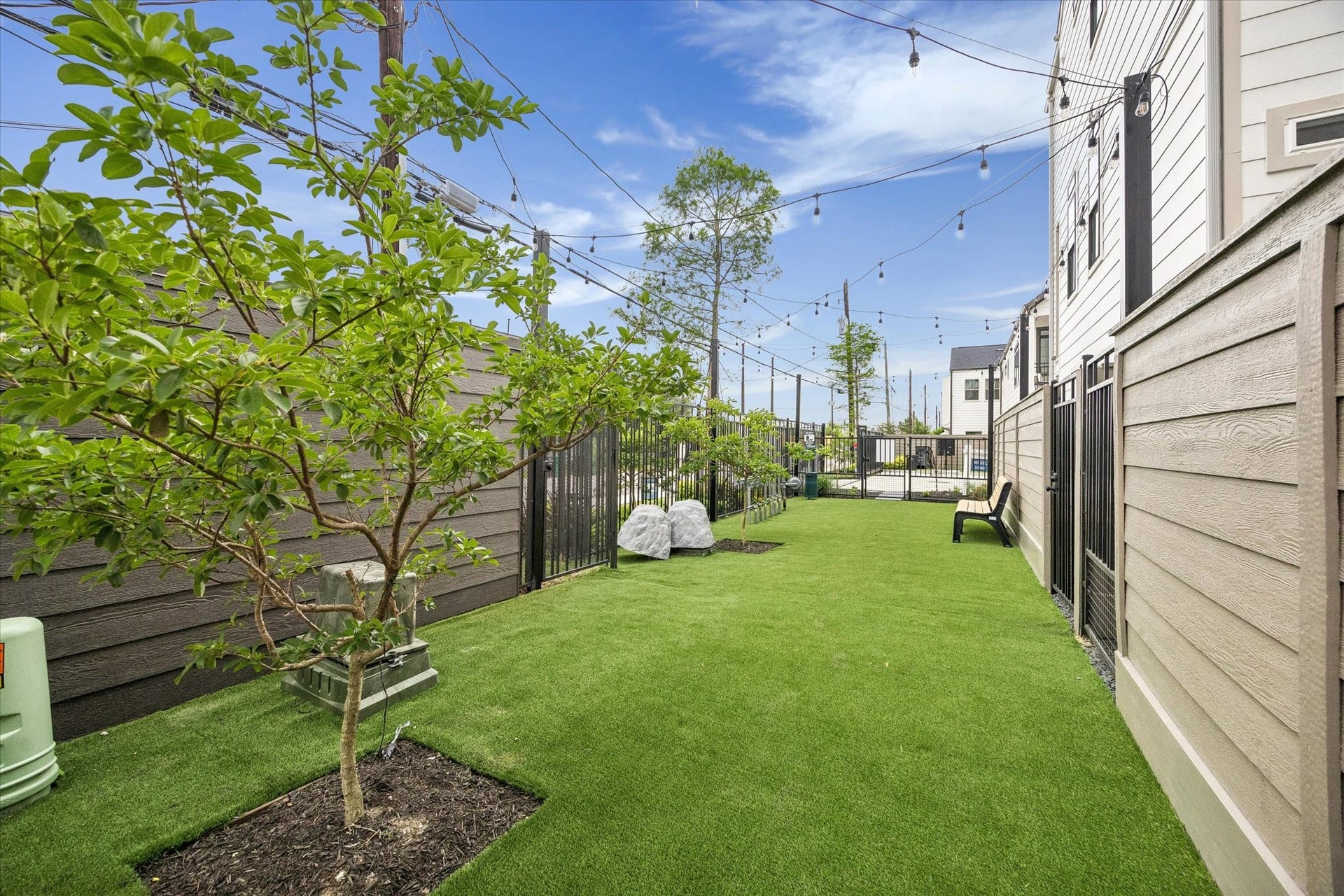 Private green space designed for pets, play, and outdoor relaxation