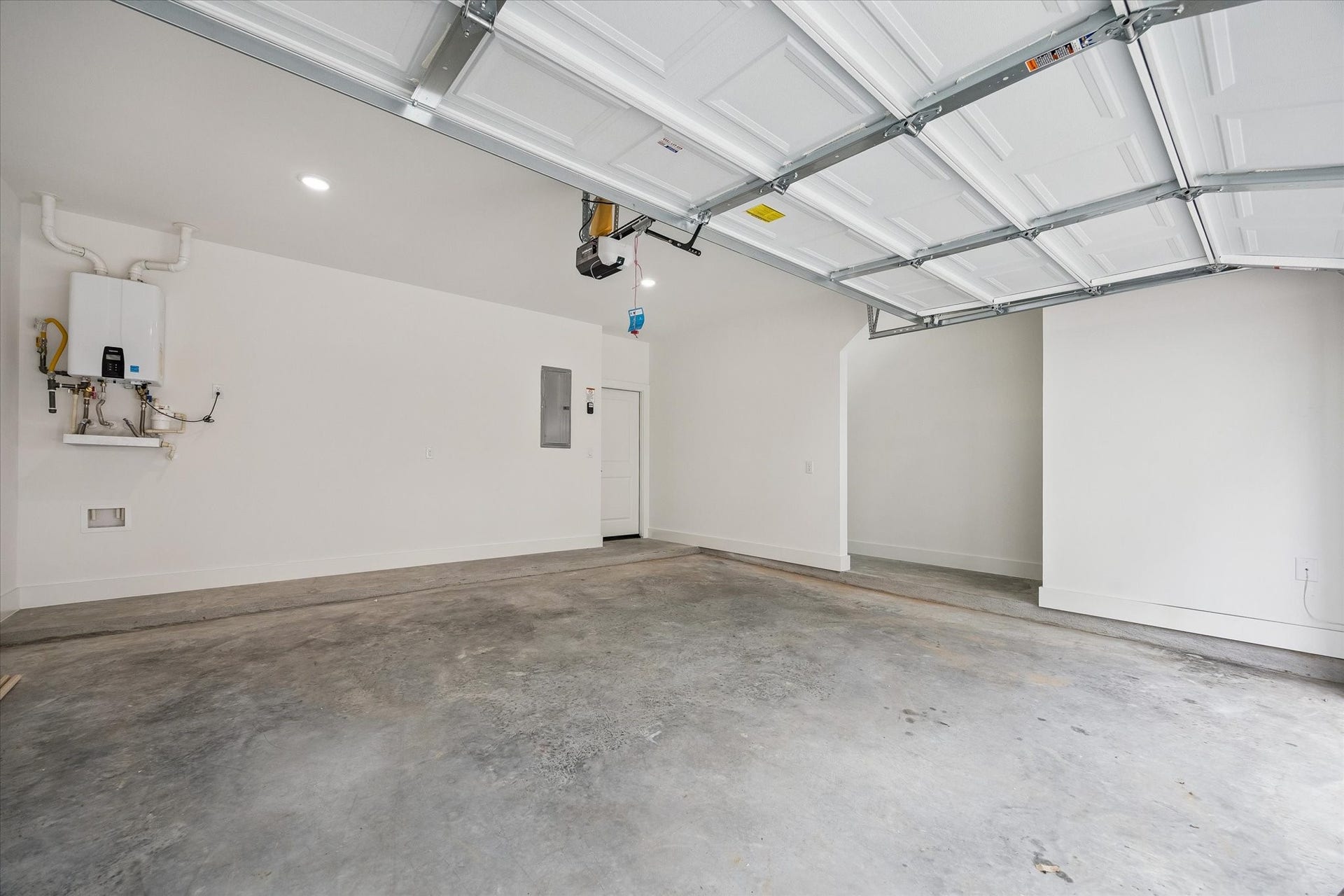 Private attached garage offering secure parking and storage flexibility