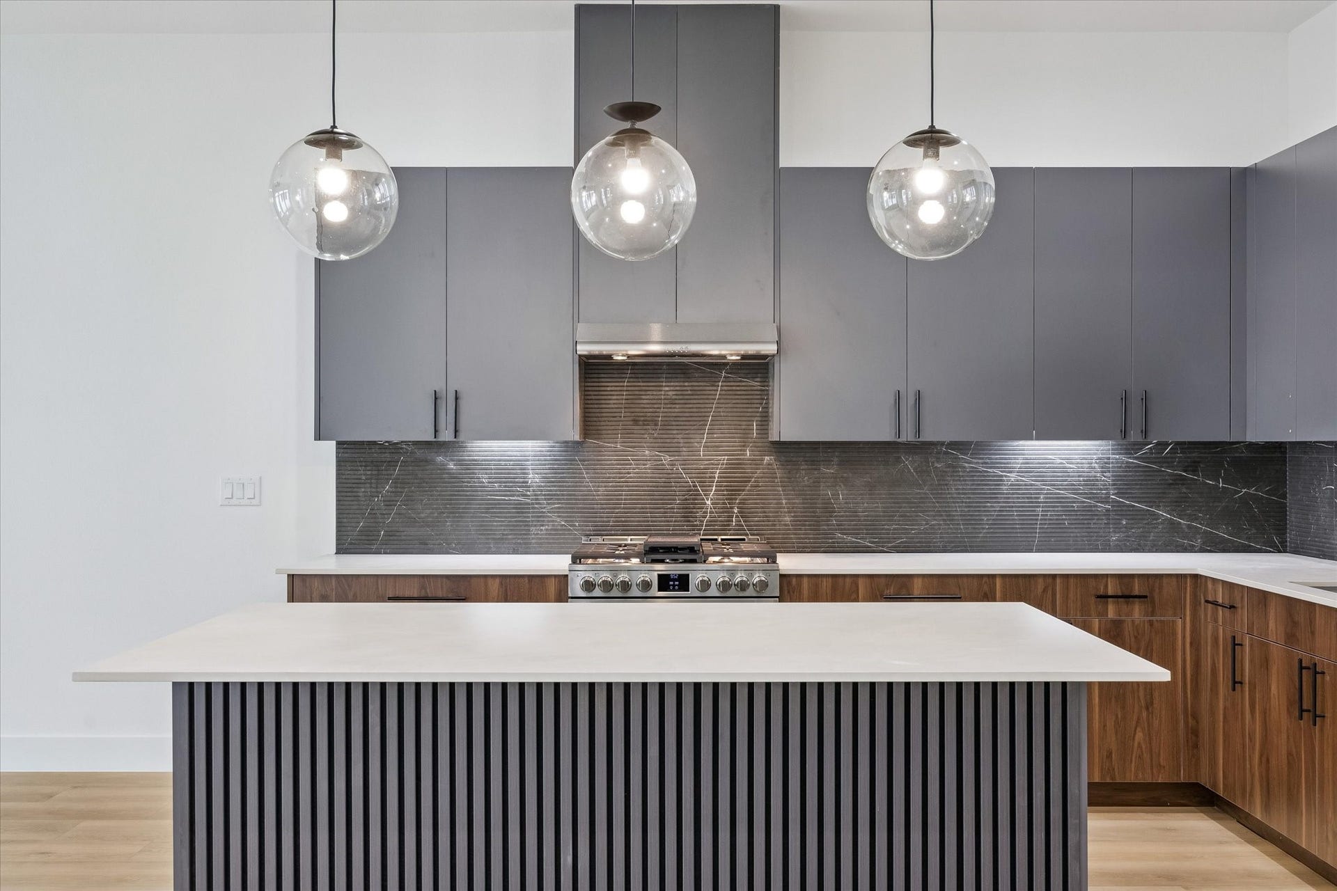 Statement island anchoring the kitchen with elevated visual impact