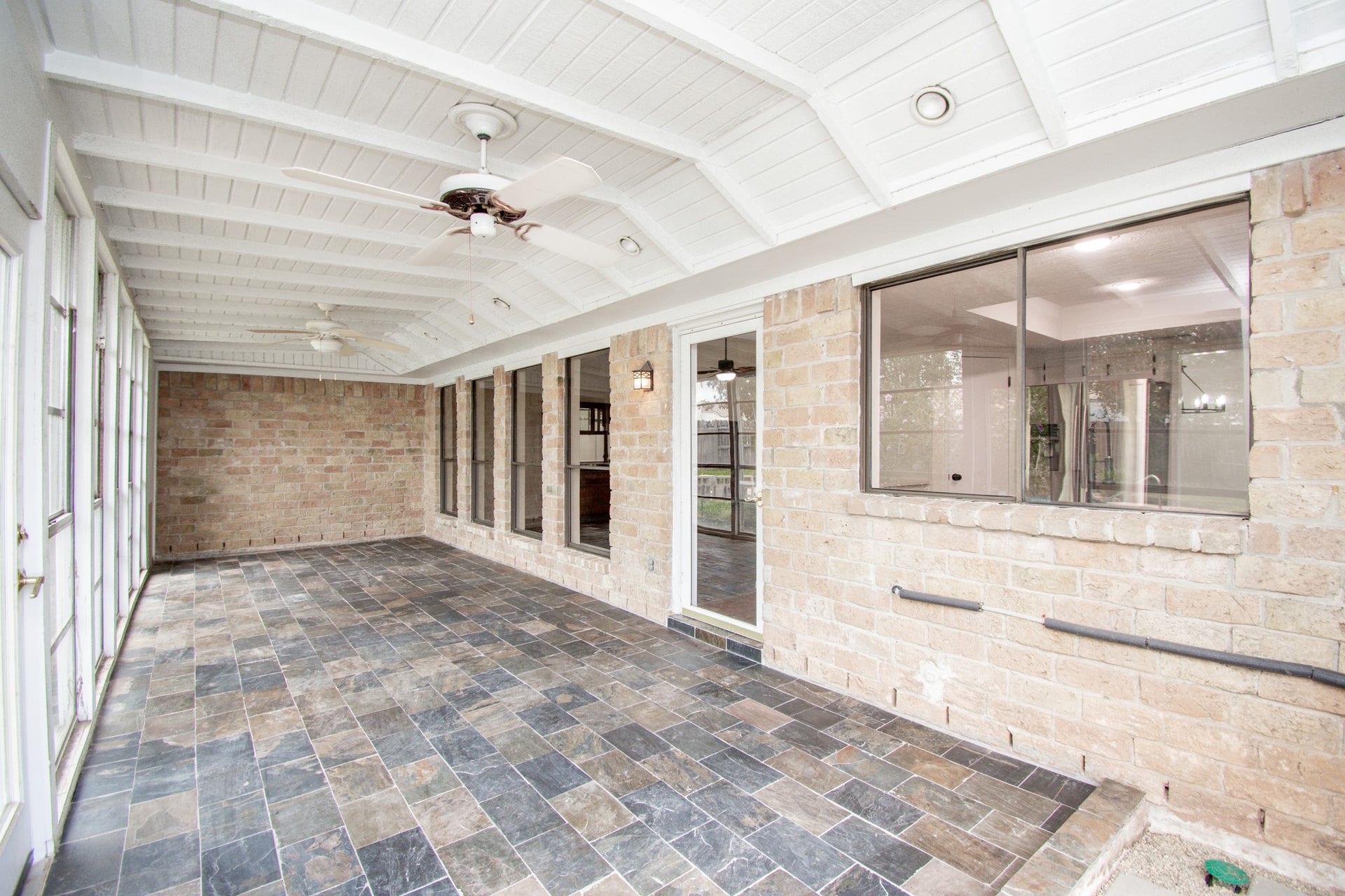 2507 Sage Brush Lane, Sugar Land, TX 77479 The sunroom is a great extension for friends and family to enjoy!
