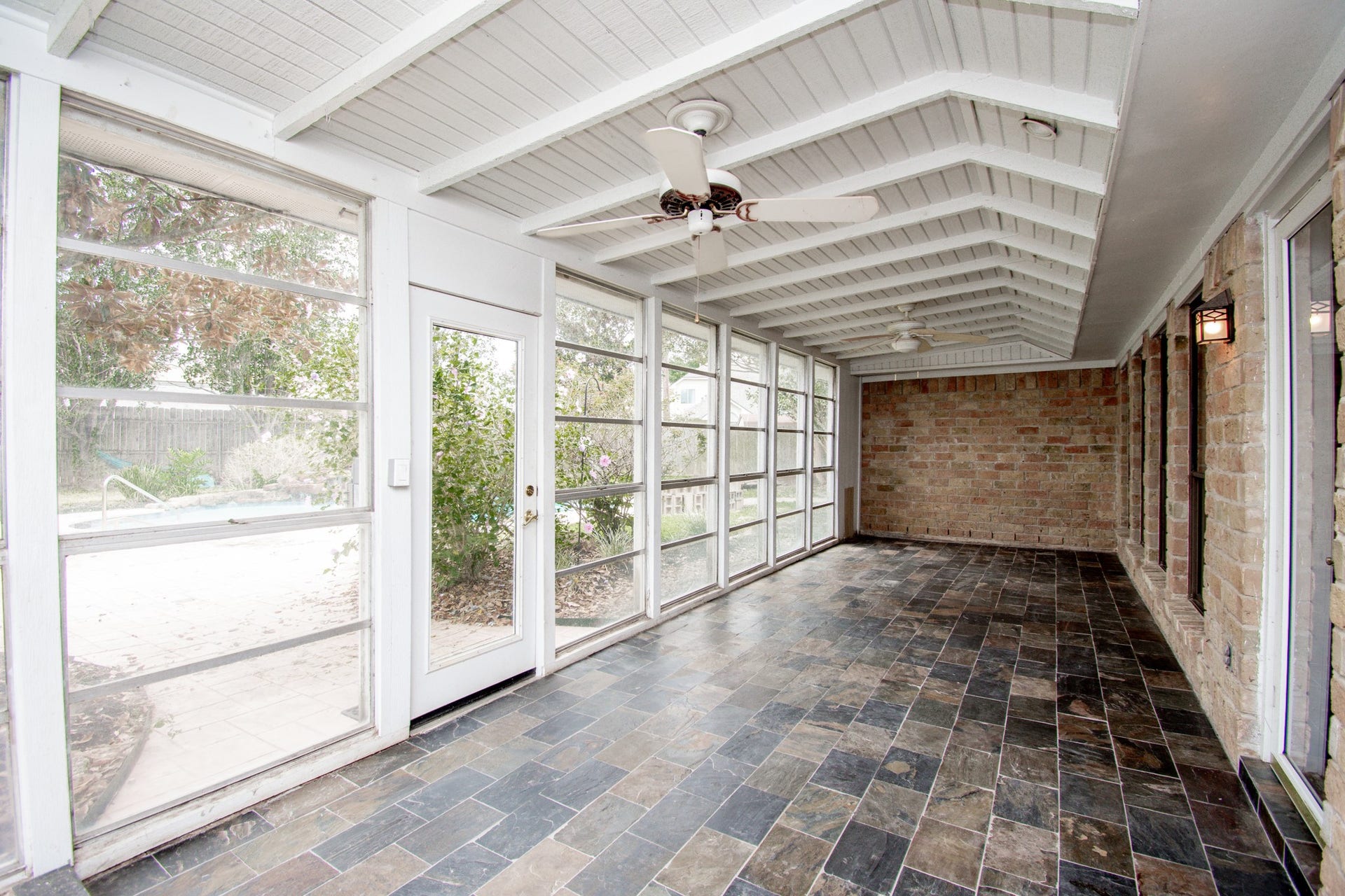 2507 Sage Brush Lane, Sugar Land, TX 77479 Enclosed Sunroom Patio with new slate tile floors
