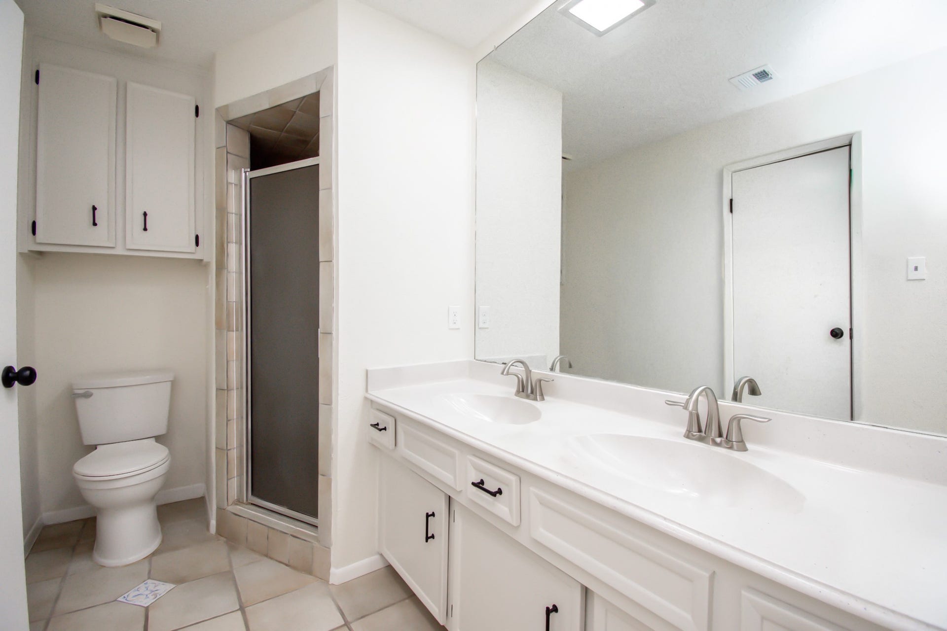 2507 Sage Brush Lane, Sugar Land, TX 77479 Primary Bath with double sinks, plenty of cabinet storage and a spacious shower