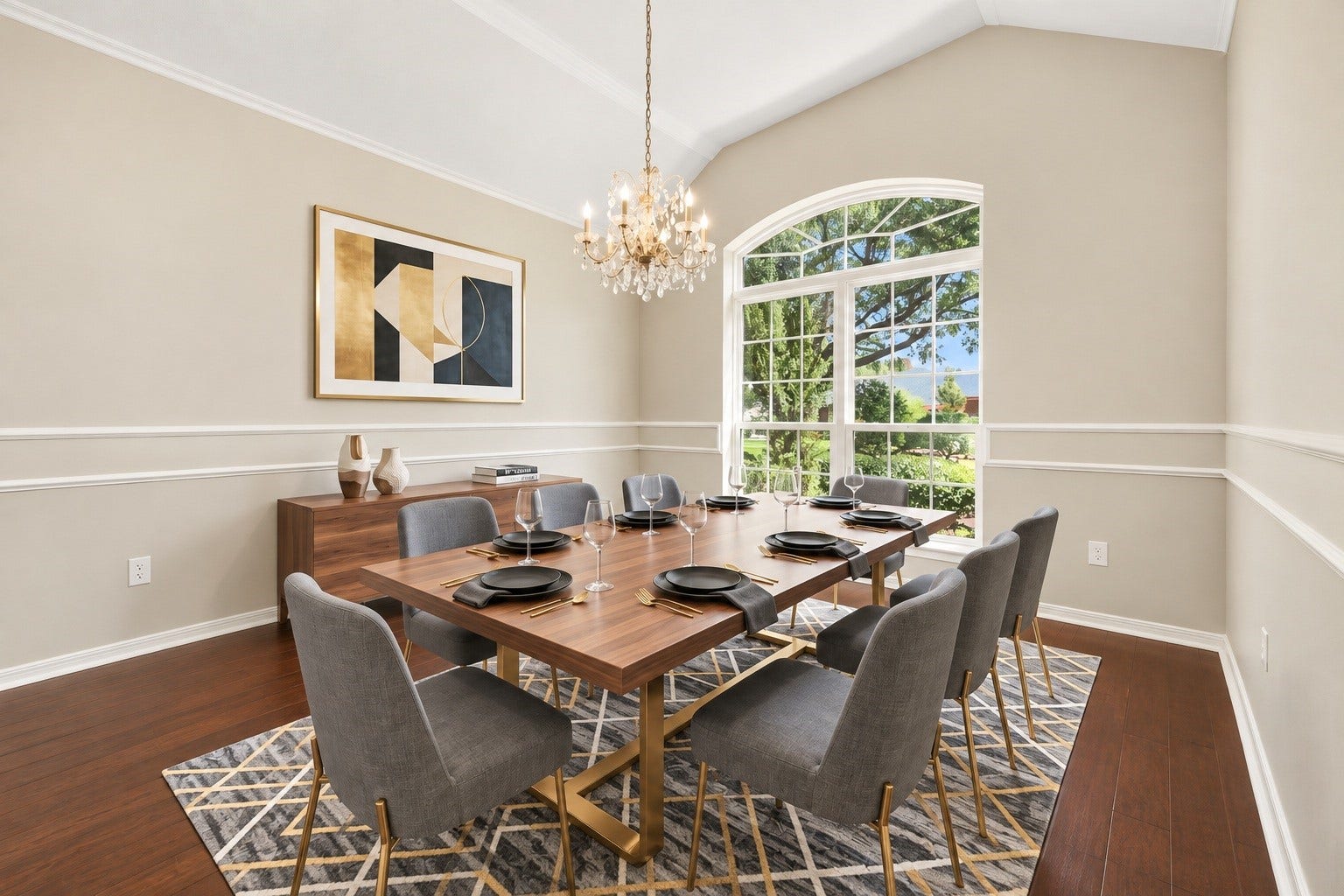 1602 Hannington Drive, Katy, TX 77450 An arched picture window, hardwood floors and chandelier give the formal dining room its own distinct character. Virtually staged.