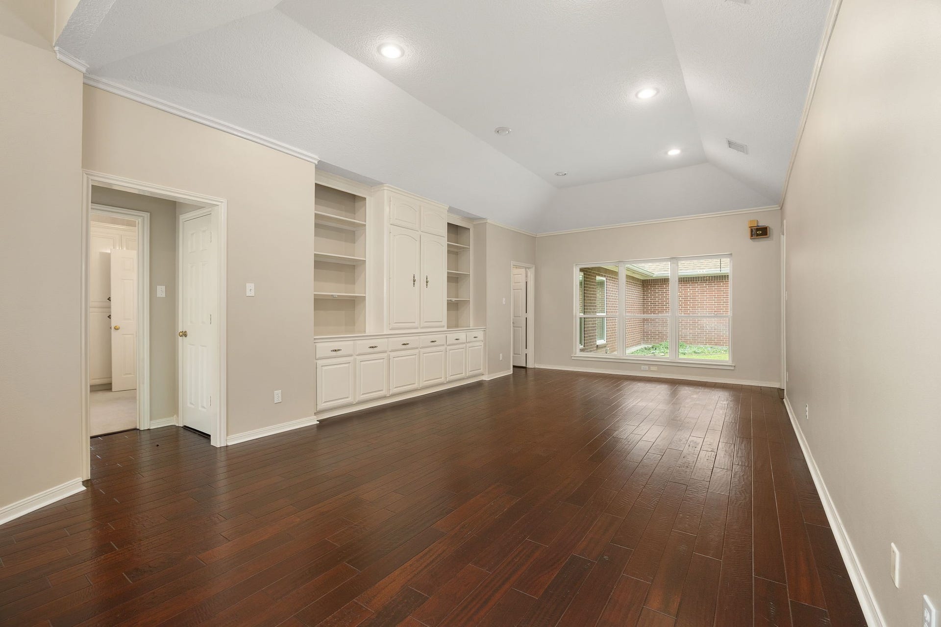 1602 Hannington Drive, Katy, TX 77450 Updated Low-E/argon windows bring natural light into the main living spaces, with hardwood flooring continuing throughout much of the home.