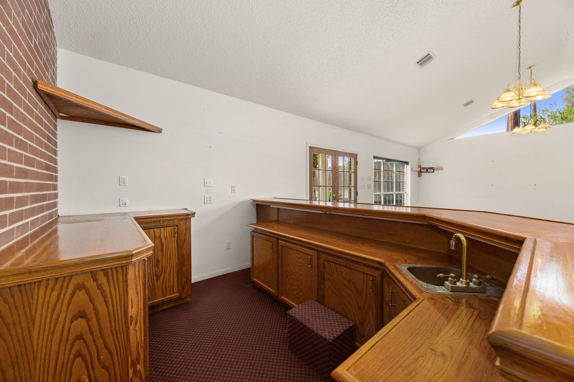1602 Hannington Drive, Katy, TX 77450 A full built-in bar gives the game room its own identity and makes this space especially well suited for entertaining.