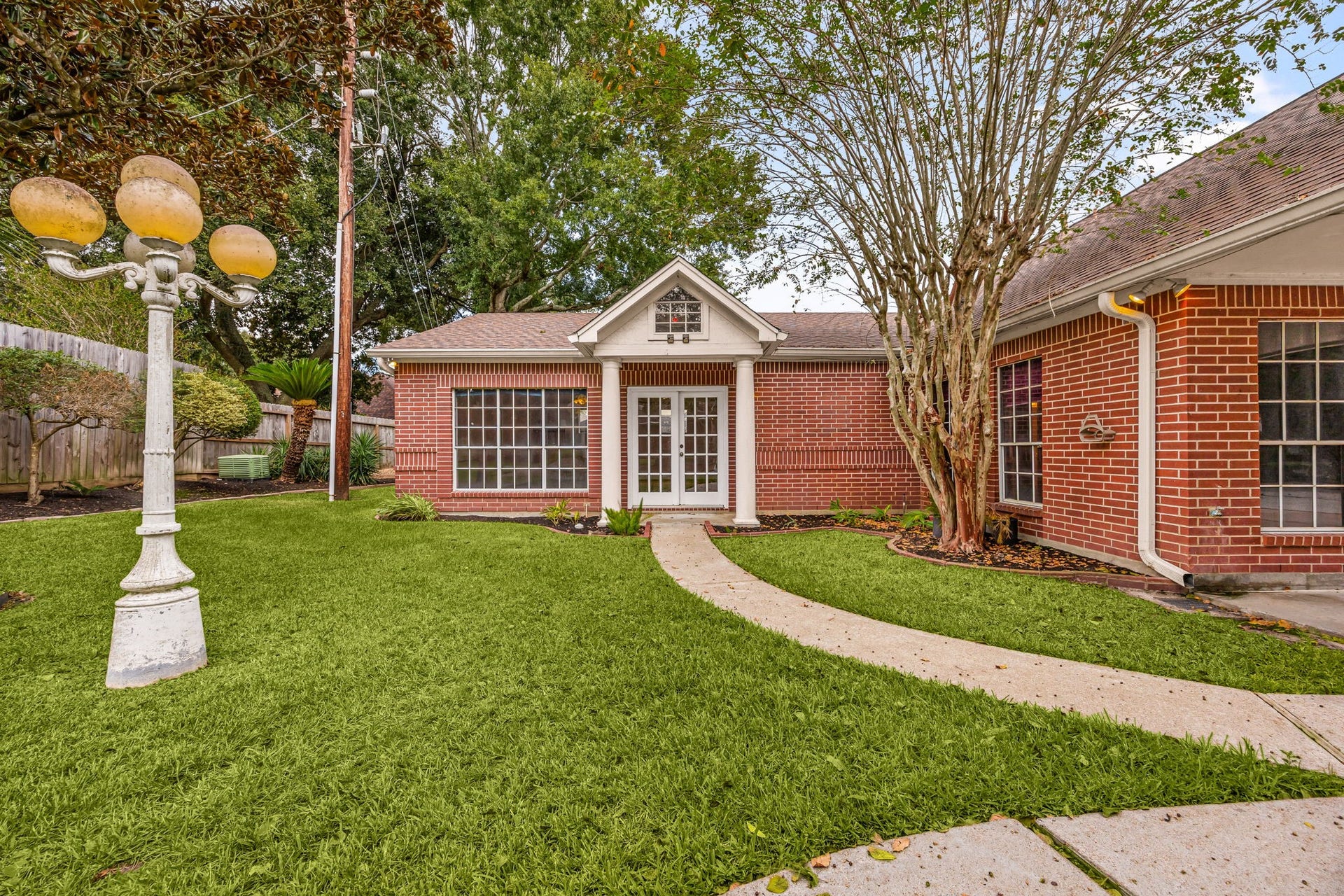 1602 Hannington Drive, Katy, TX 77450 Beyond the main home, a separate casita and adjoining entertainment and workshop spaces create an entirely different wing of the property.