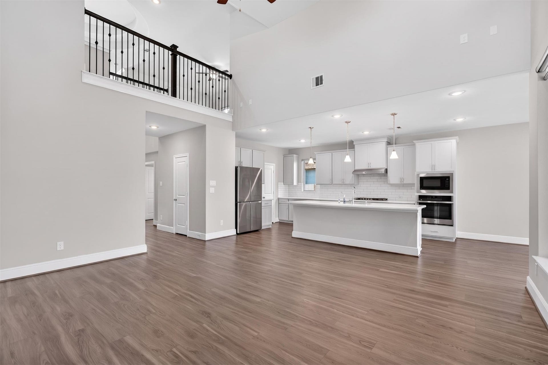 Its open concept promotes easy movement between the living spaces and kitchen, perfect for daily living.