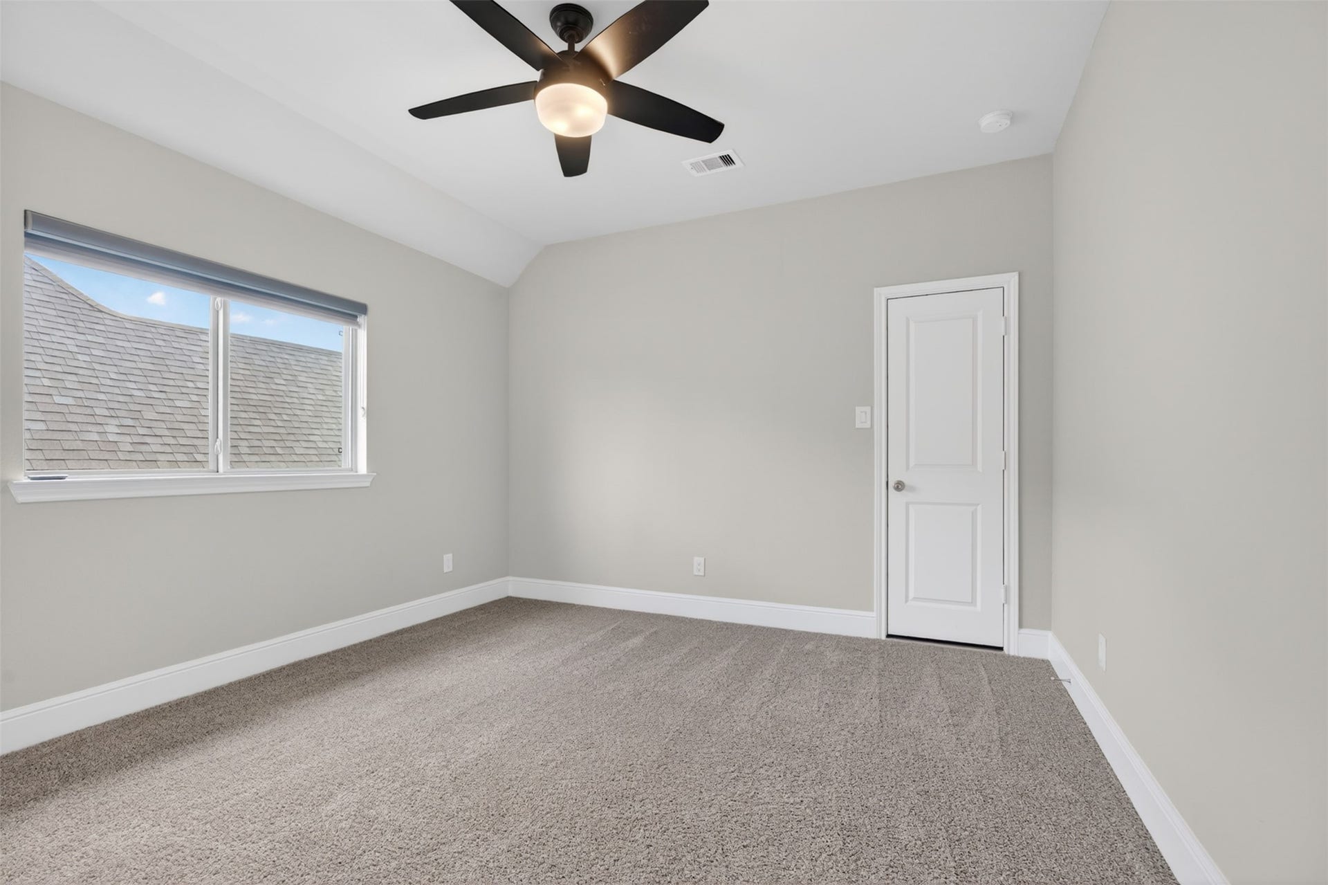 The upstairs secondary bedrooms offer comfortable accommodations with generous proportions, soft carpeting, and abundant natural light.