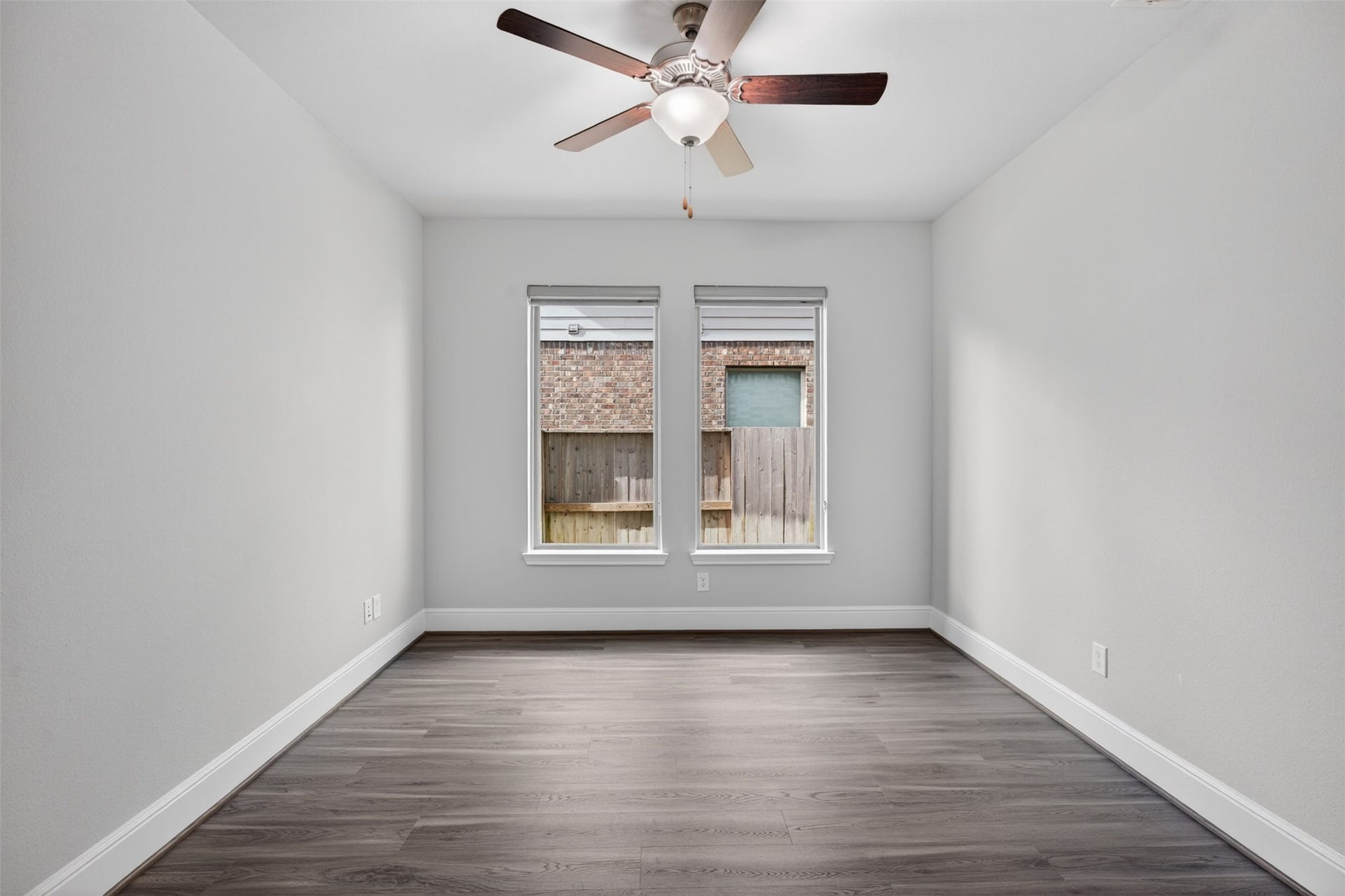 With large windows that welcome an abundance of natural light, this versatile space feels bright, open, and inspiring throughout the day.