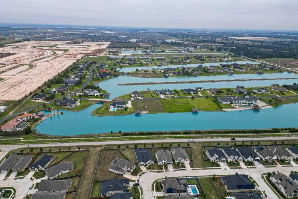 Residents enjoy exceptional amenities including The Oaks clubhouse, a resort-style pool, fitness center, parks, trails, and year-round community events. Conveniently located near I-10 and the Katy area, Cane Island offers the perfect blend of luxury living, recreation, and community connection.