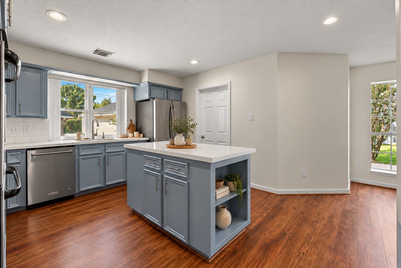 2108 Cherry Hills Drive, League City, TX 77573 The updated chef-inspired island kitchen showcases extensive countertops, rich solid wood cabinetry, stainless steel appliances and double ovens.