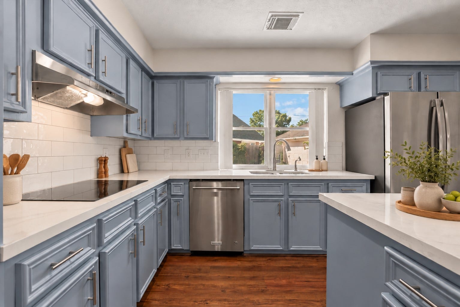 2108 Cherry Hills Drive, League City, TX 77573 The updated chef-inspired island kitchen showcases extensive countertops, rich solid wood cabinetry, stainless steel appliances and double ovens.