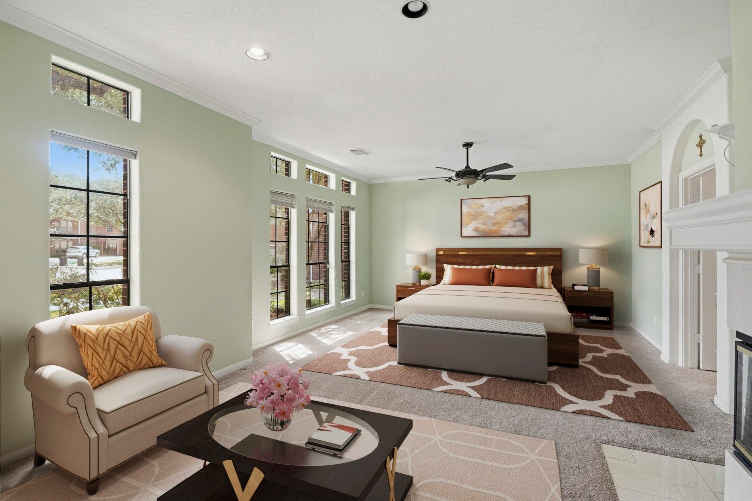 16 Fosters Court, Sugar Land, TX 77479 Virtually Staged: This spacious primary bedroom offers an airy retreat with abundant natural light from multiple tall windows and transom windows above.