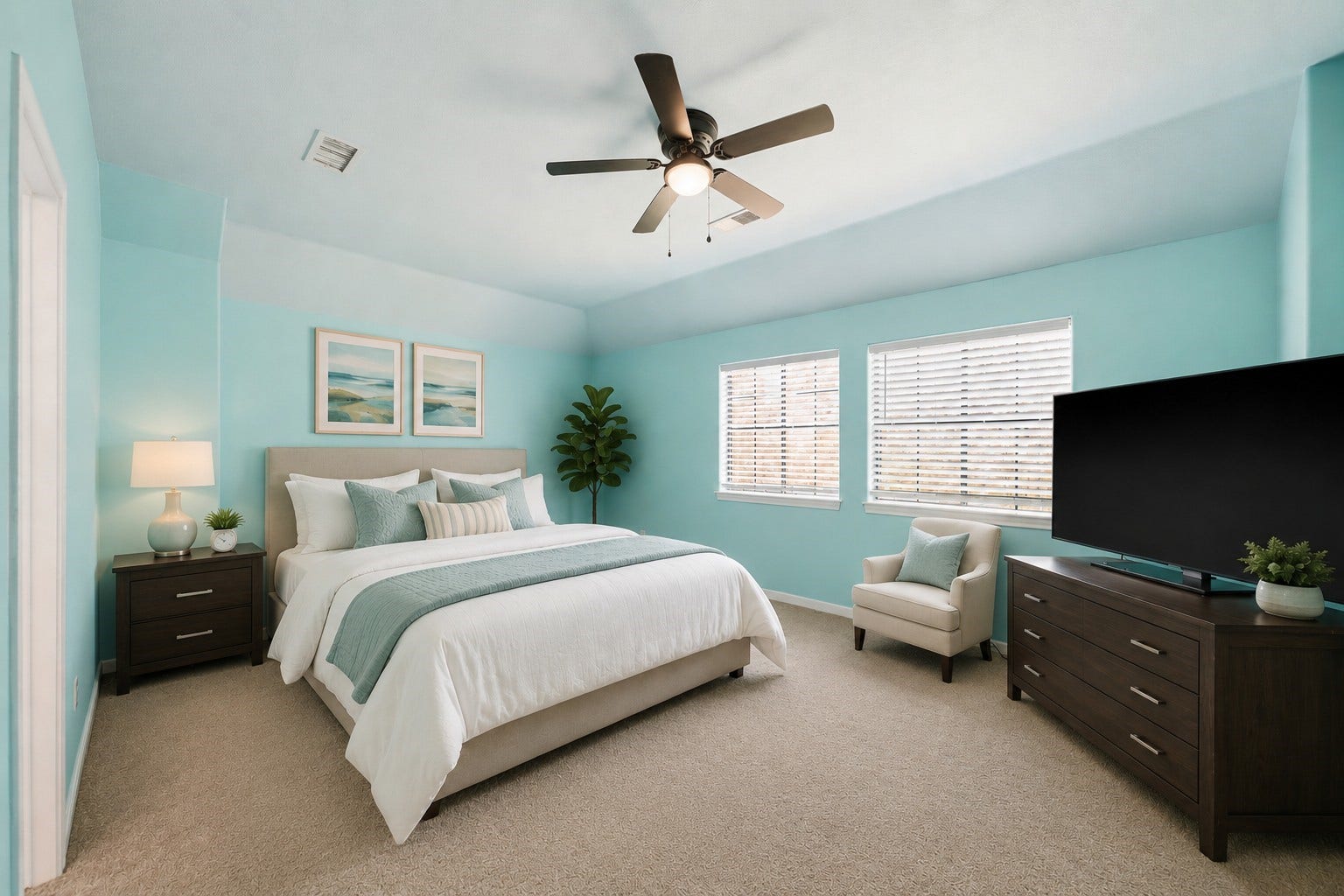 16 Fosters Court, Sugar Land, TX 77479 Virtually Staged: This spacious bedroom features high ceilings, soft carpeting, and a ceiling fan for added comfort. Two large windows provide abundant natural light, while the generous open layout offers plenty of room for a full bedroom suite, sitting area, or additional furniture.
