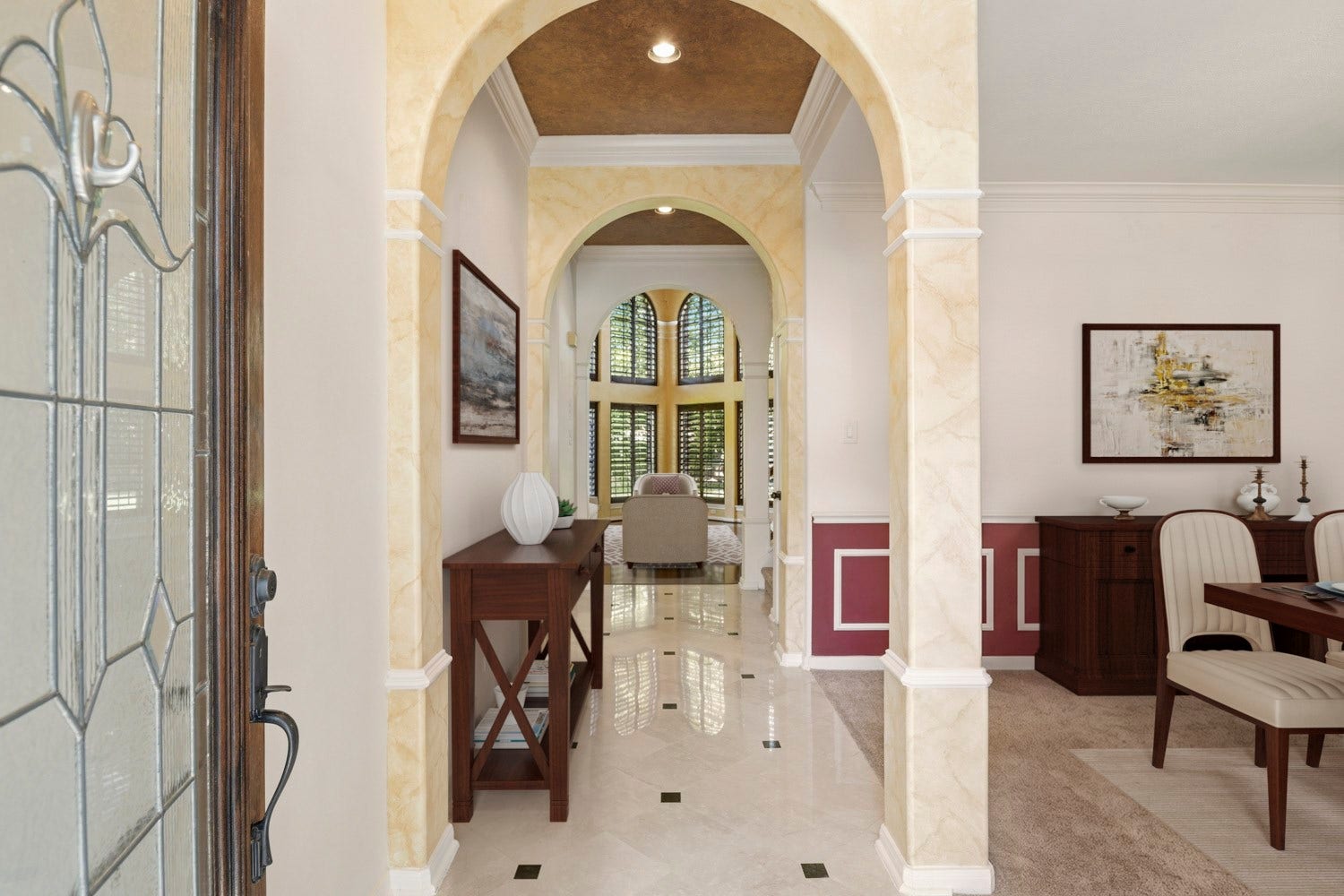 16 Fosters Court, Sugar Land, TX 77479 Virtually Staged: This elegant entryway welcomes you with a series of graceful arched openings, decorative columns, and polished tile flooring.
