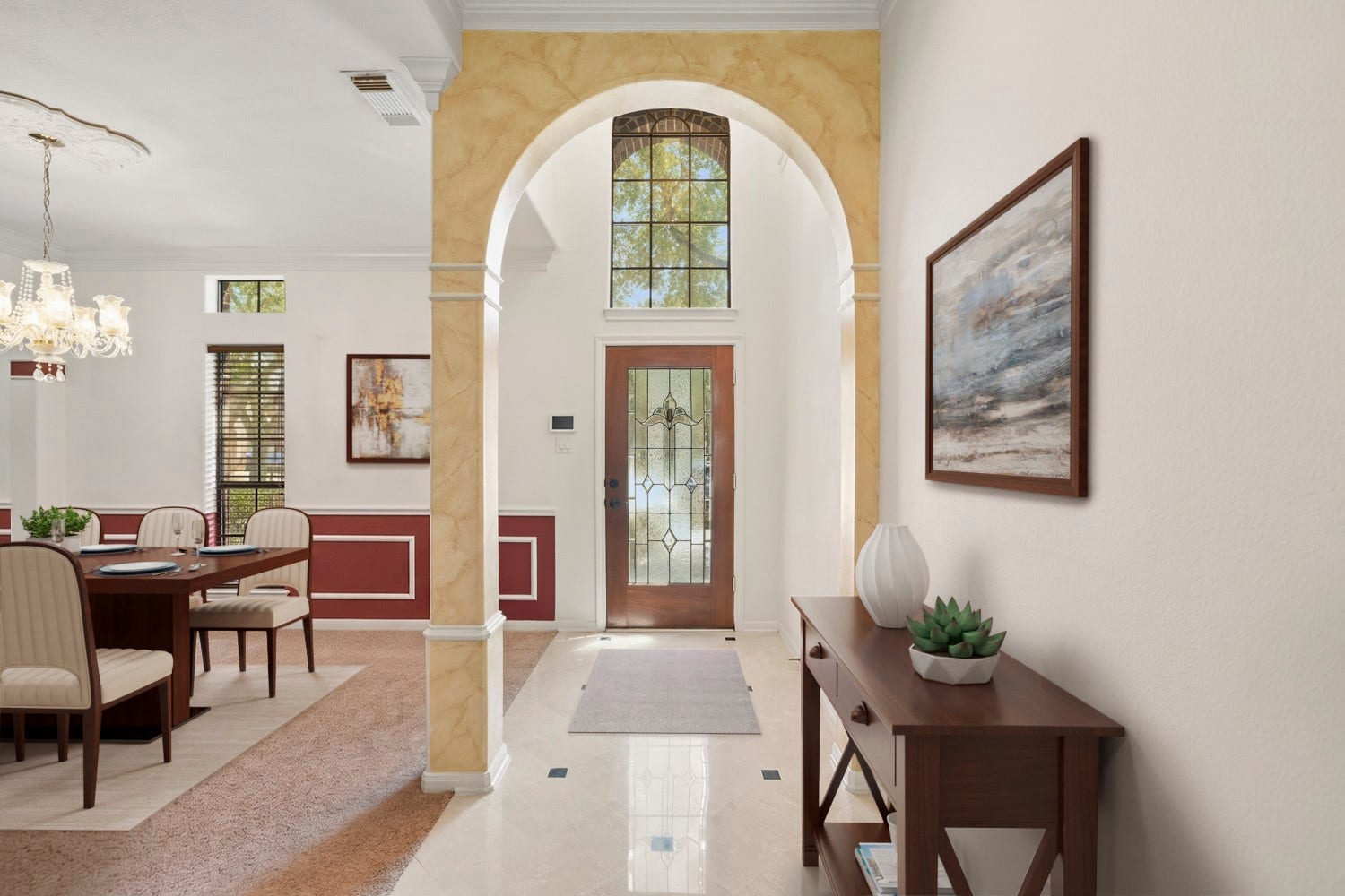 16 Fosters Court, Sugar Land, TX 77479 Virtually Staged: The open layout flows seamlessly into the formal dining room, creating a grand and welcoming entrance for guests.