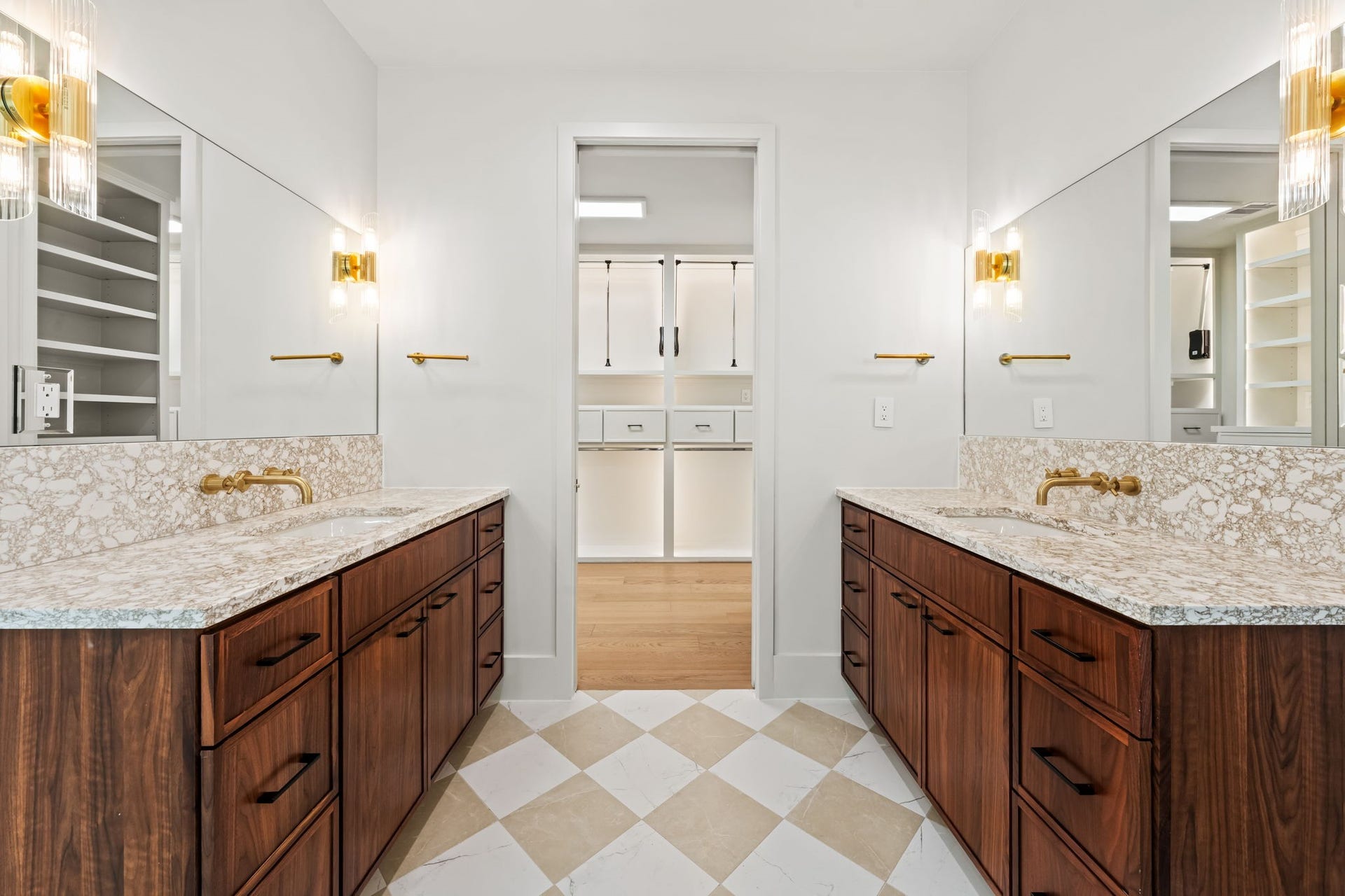 5409 Chevy Chase, #D, Houston, TX 77056 Primary bathroom with checkered-tile floors, dual vanities and two closets.