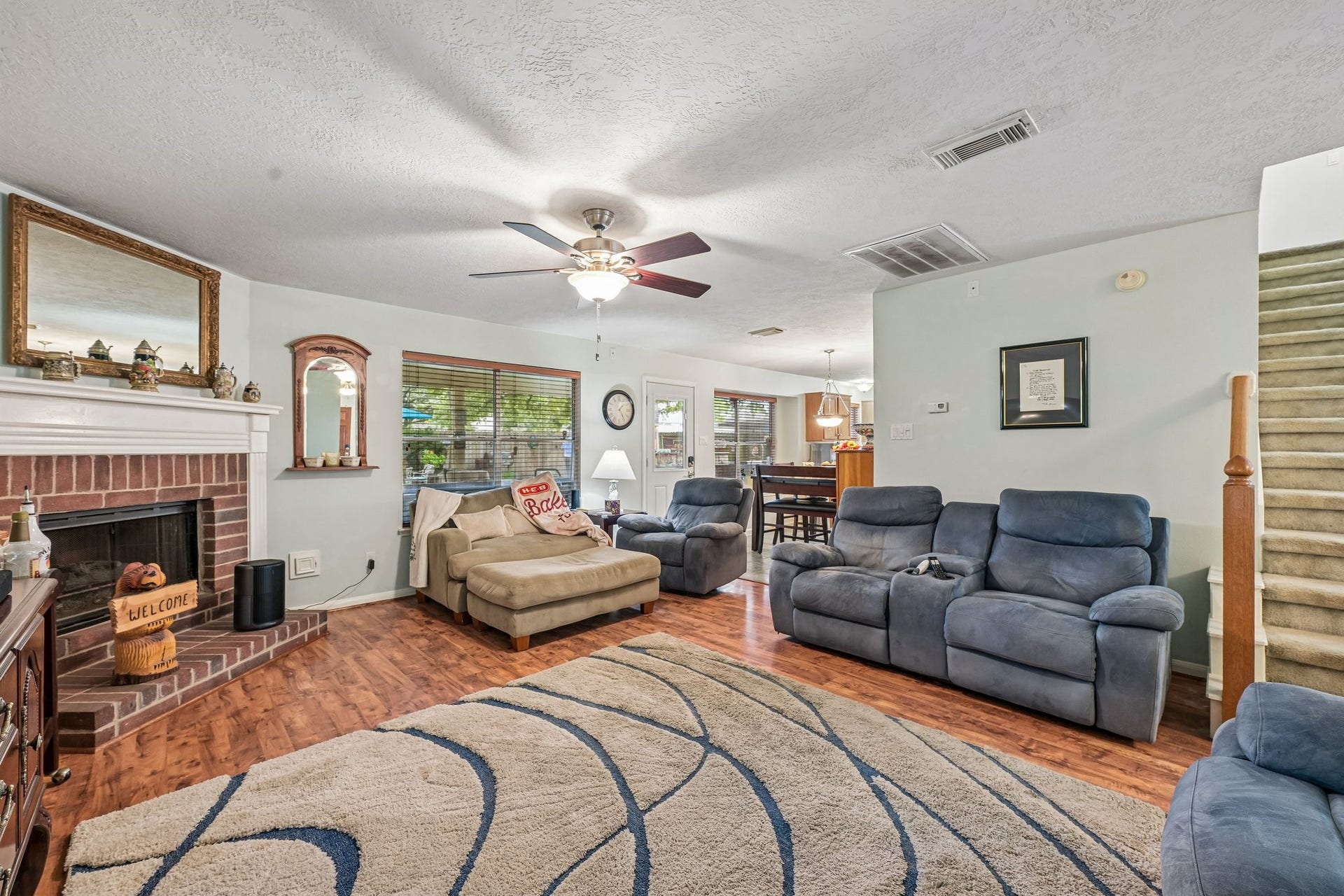 14219 Cypress Ridge Drive, Cypress, TX 77429 Open family area seamlessly connecting to the entryway and staircase, perfect for everyday living and entertaining.