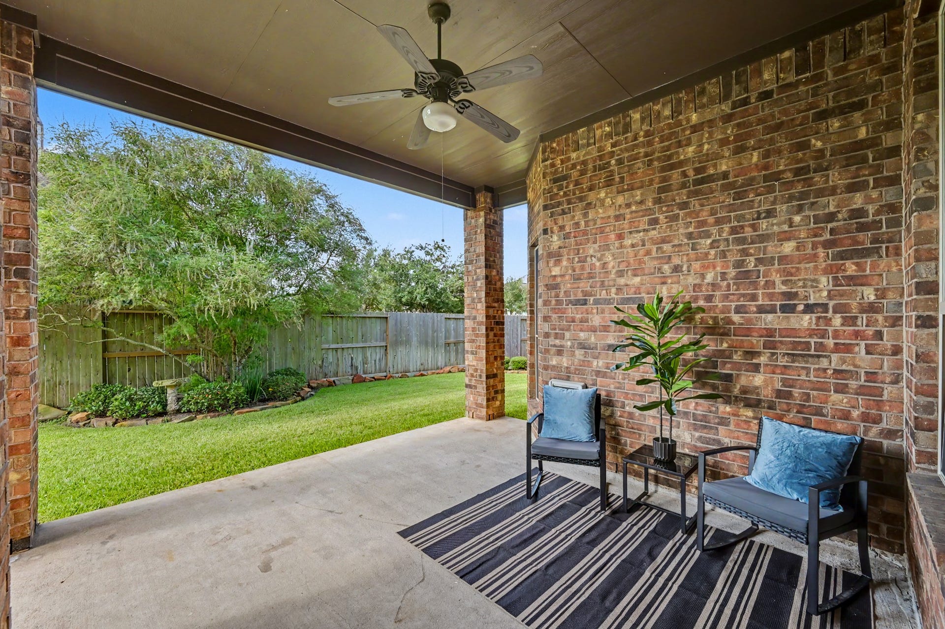 Covered back patio, perfect for morning coffee, evening dinners and Texas outdoor living