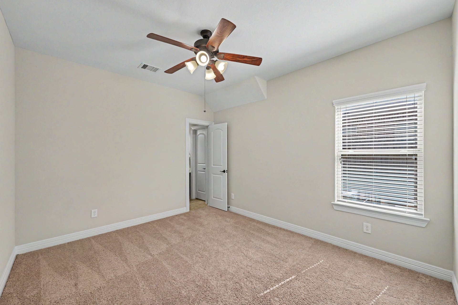 Bedroom 3 ready for it's next chapter. This room offers its own private bathroom