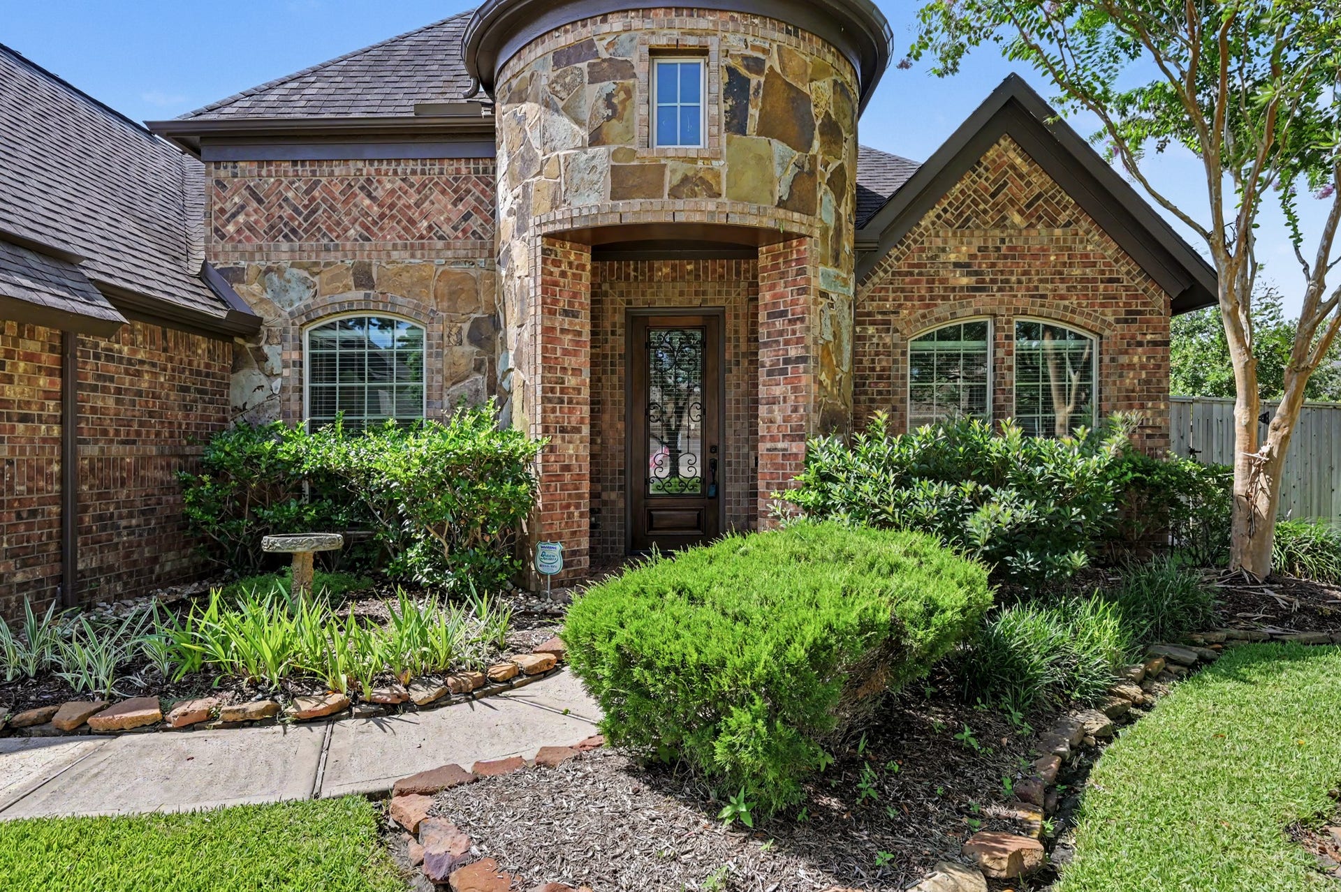 Striking French Georgian Exterior with oversized 2 car extended garage
