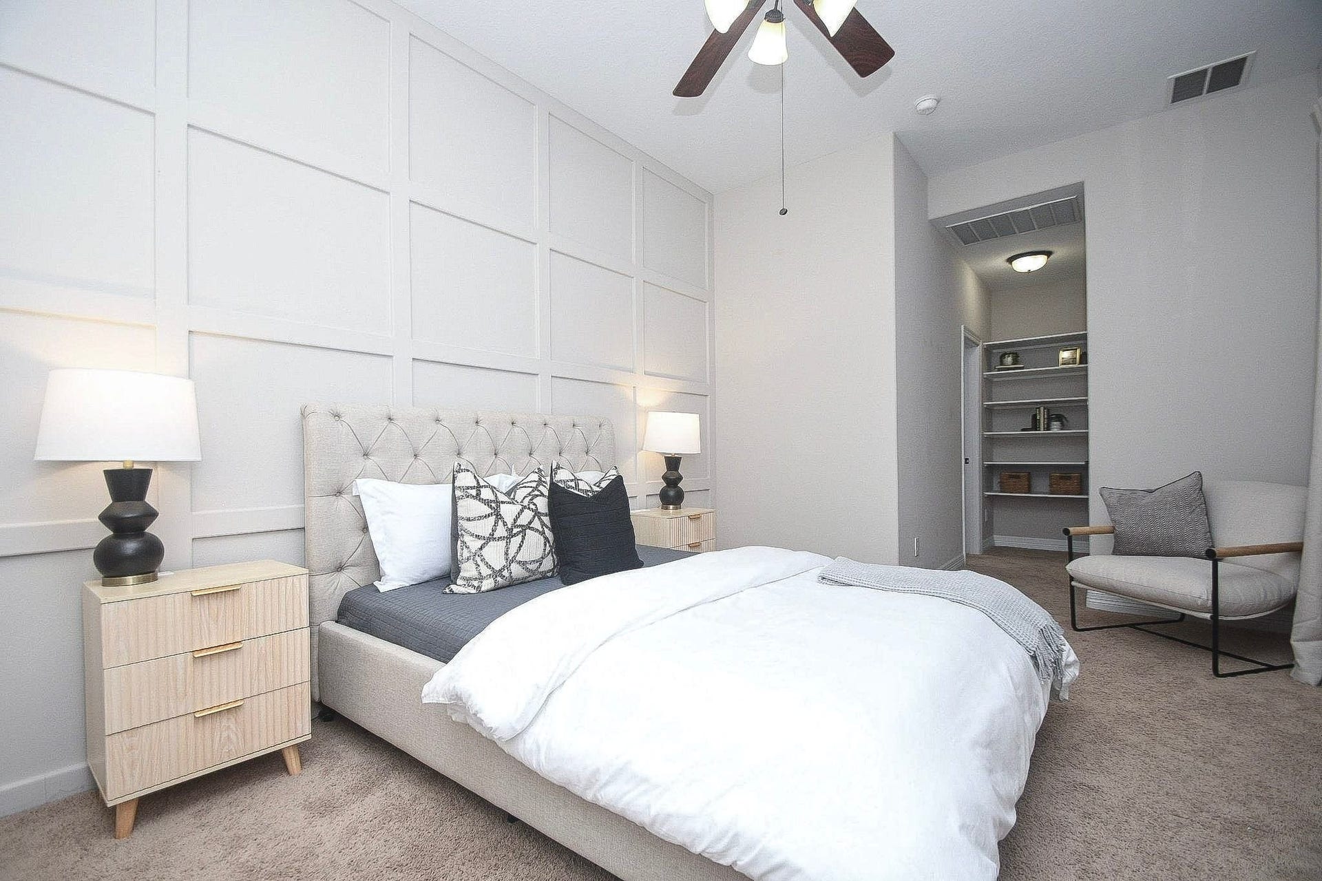 Another angle of the bedroom highlighting the natural light & spacious layout