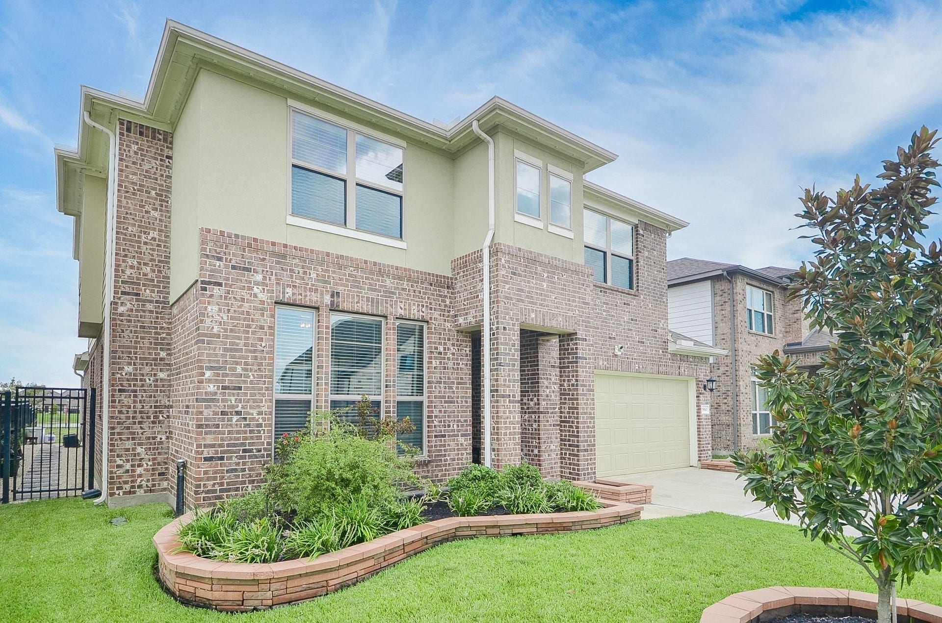 860 Marisol Bay Drive, Katy, TX 77493 The flower beds are brick lined and well maintained