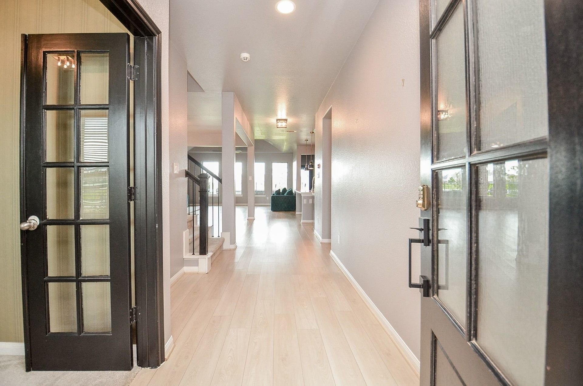 860 Marisol Bay Drive, Katy, TX 77493 As you enter the front door you are welcomed with beautiful light colored flooring and tall ceilings.