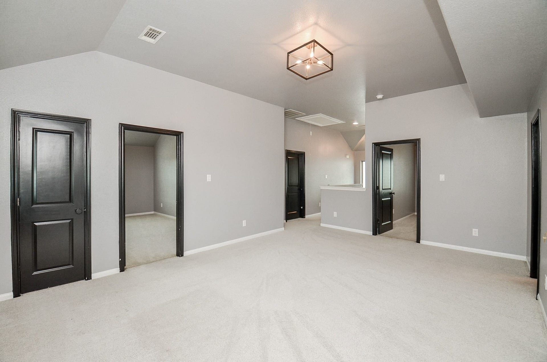 860 Marisol Bay Drive, Katy, TX 77493 Reverse view of the upstairs game room with view into the media room on the left.