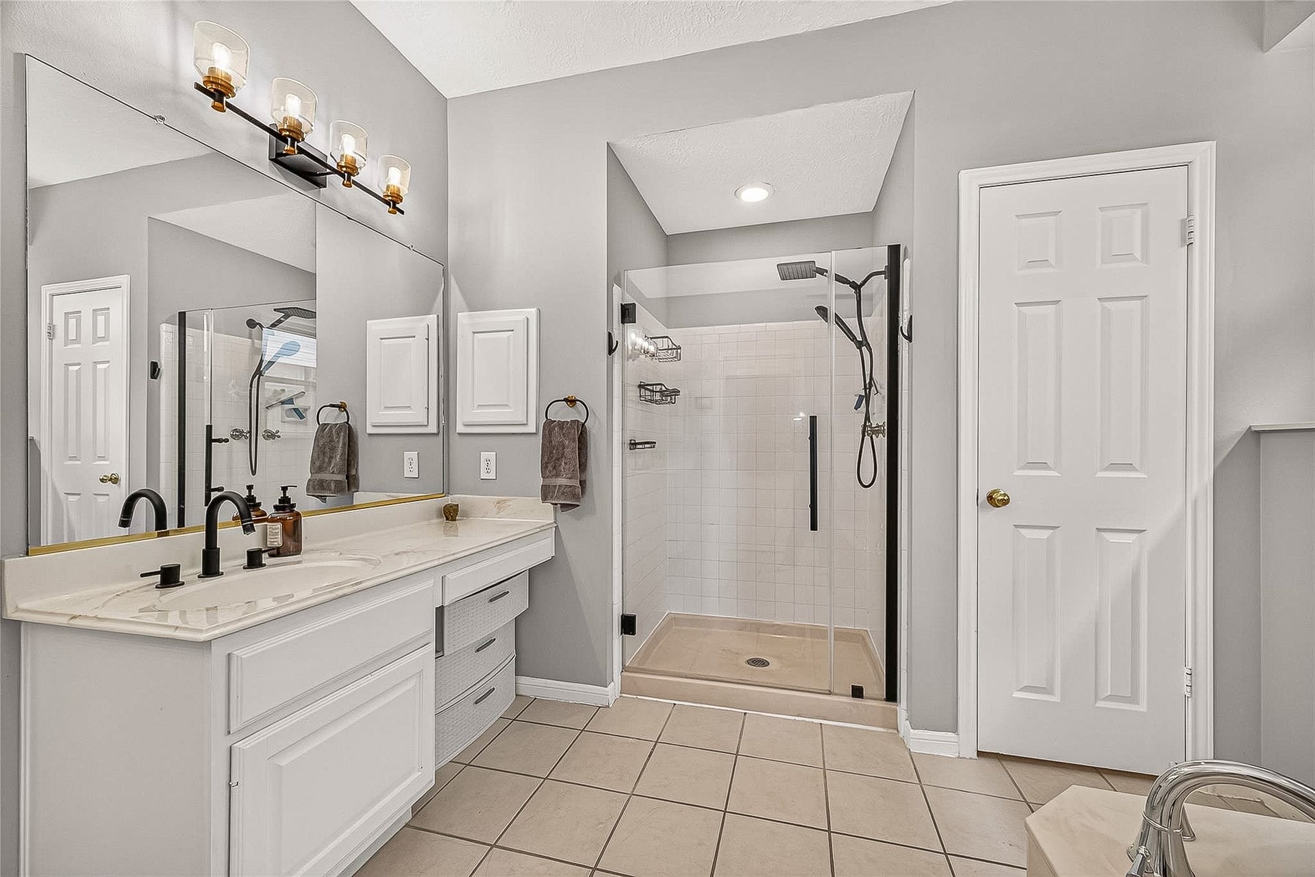 12906 Peach Meadow Drive, Cypress, TX 77429 Updated primary bath with separate shower and tub