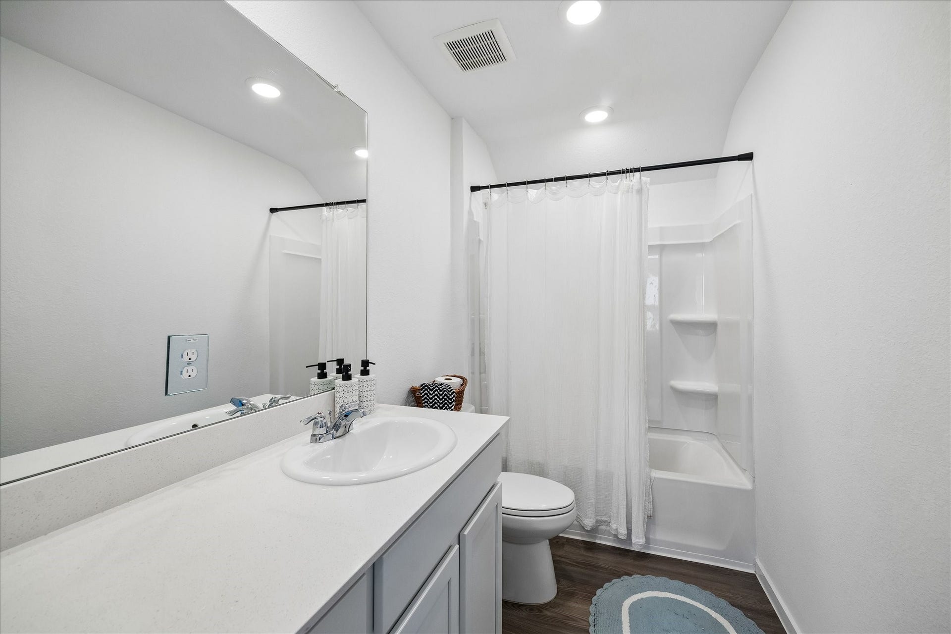 4322 Banfield Hills Lane, Baytown, TX 77521 The guest bathroom located on the upper level of the property, which is fully equipped with modern fixtures and clean, neutral finishes.