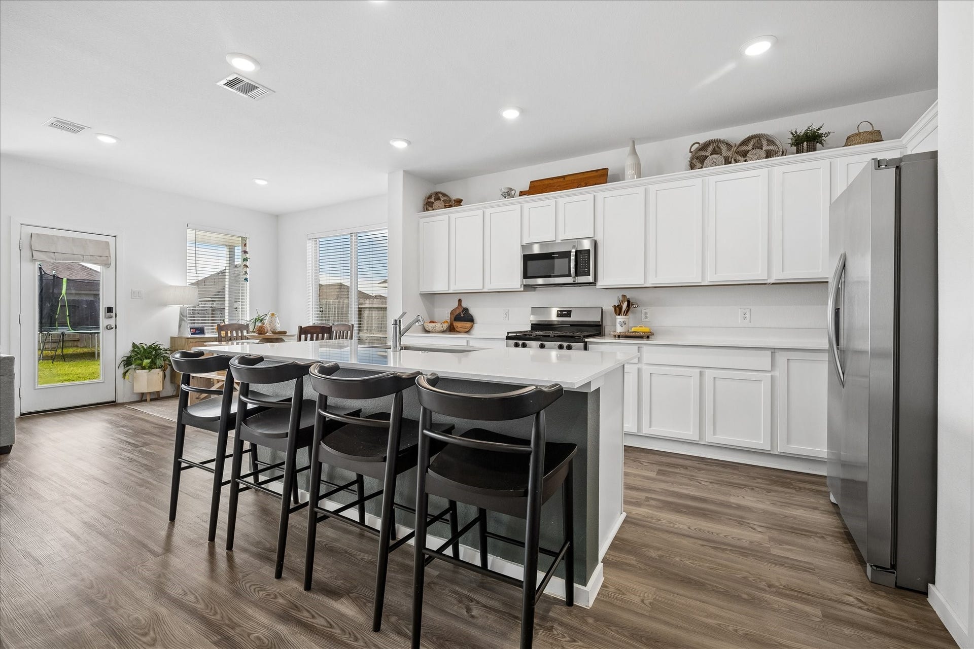 4322 Banfield Hills Lane, Baytown, TX 77521 Spacious open kitchen featuring a large island, ideal for cooking and connecting with family.
