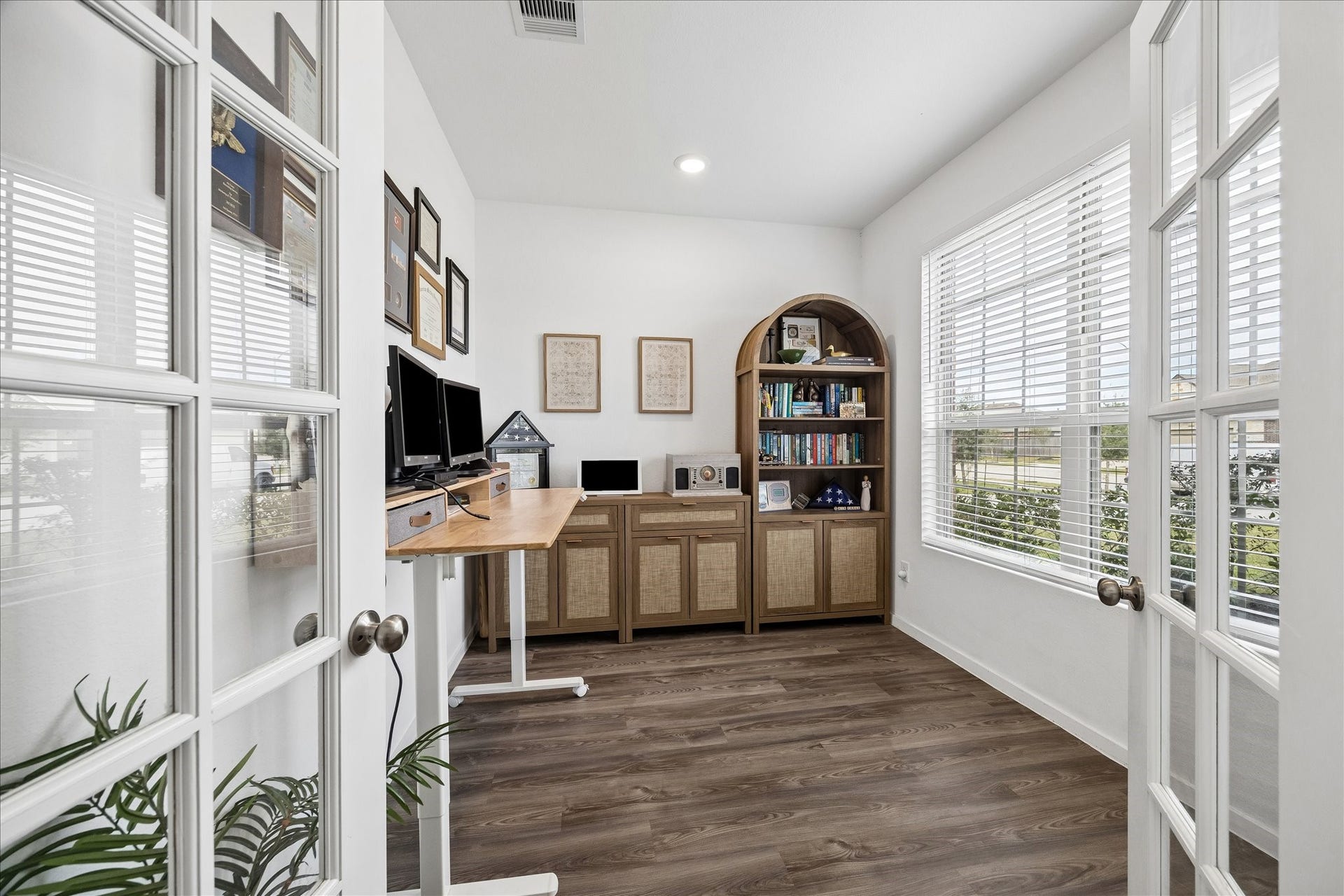 4322 Banfield Hills Lane, Baytown, TX 77521 French doors open to a light filled home office space