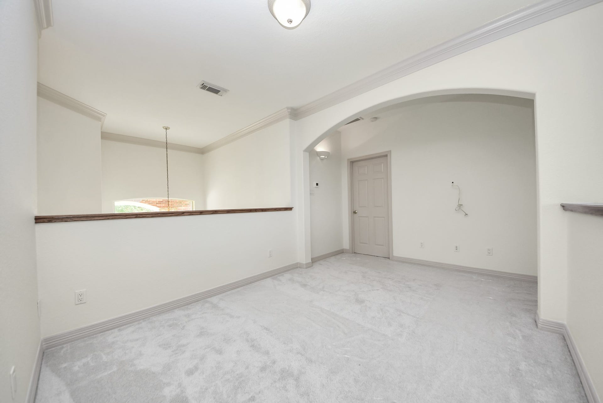 3237 Avenue G 1/2, Santa Fe, TX 77510 Upstairs gameroom overlooking the living room and entry.