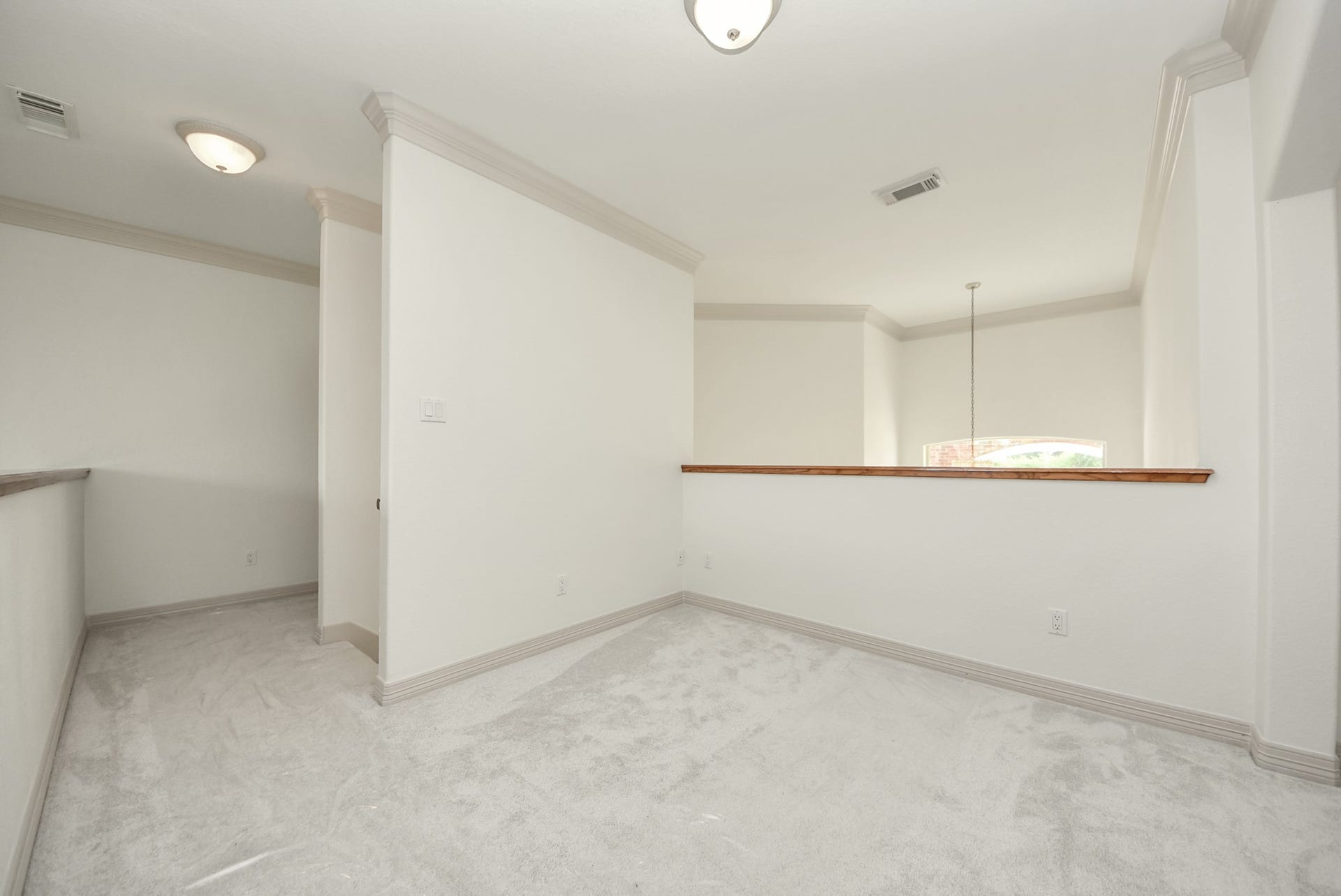 3237 Avenue G 1/2, Santa Fe, TX 77510 Upstairs gameroom overlooking the living room and entry.