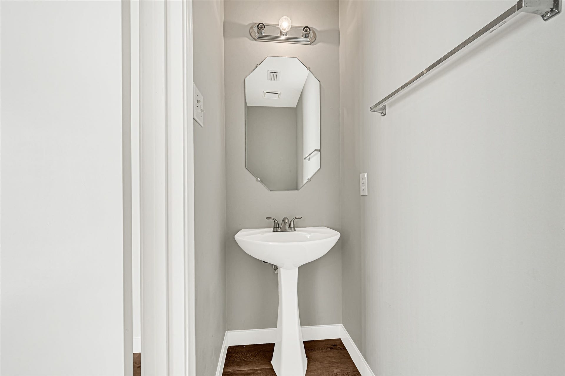 Half bath located on first floor, perfect for guests.