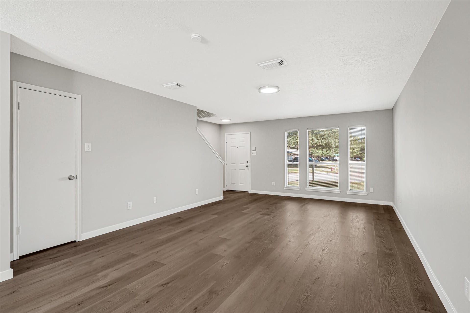 Welcoming interior featuring fresh neutral tones, contemporary finishes, and a spacious floor plan
