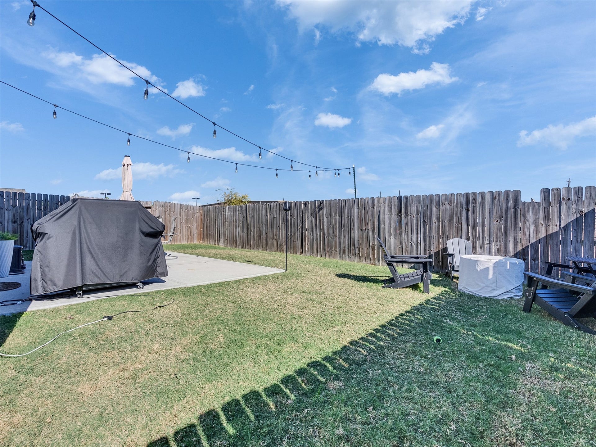 An impressively large, fully-fenced yard.  A rare for in-town living!
