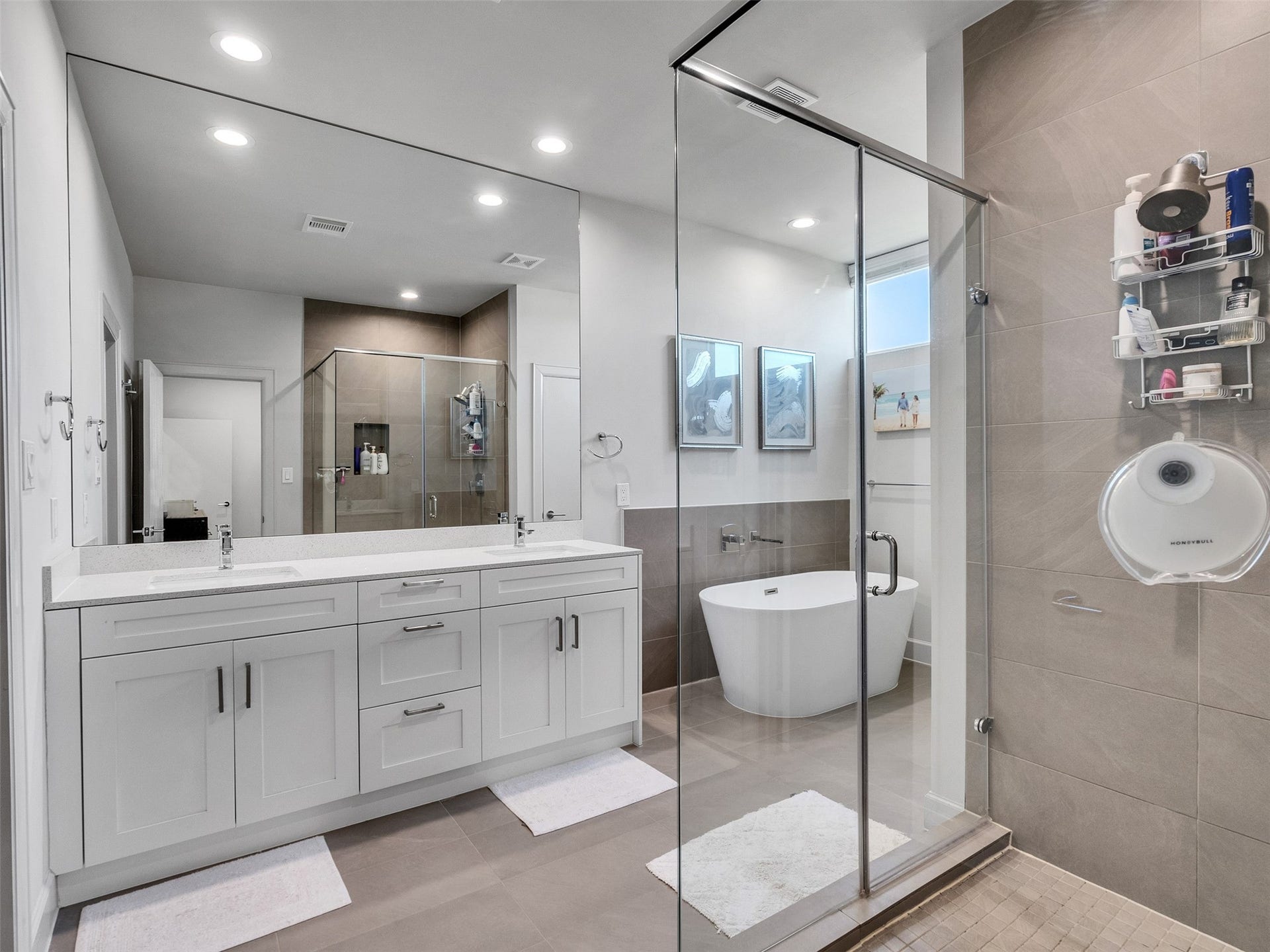 The showstopper! Massive walk-in shower and premium finishes.