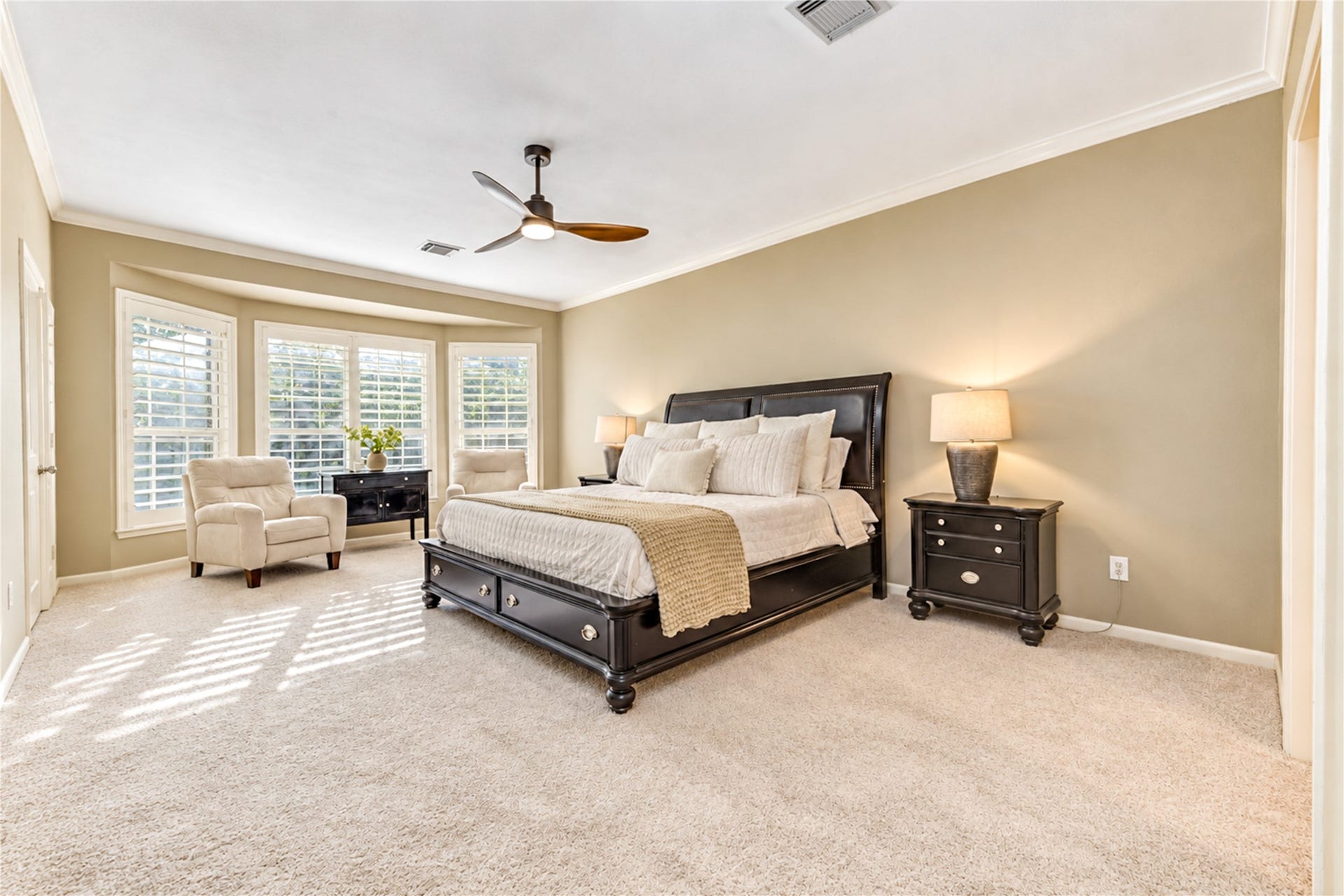 23338 Grand Springs Drive, Katy, TX 77494 The primary bedroom has an on-trend ceiling fan on remote and NEW carpet (Sept 2026).