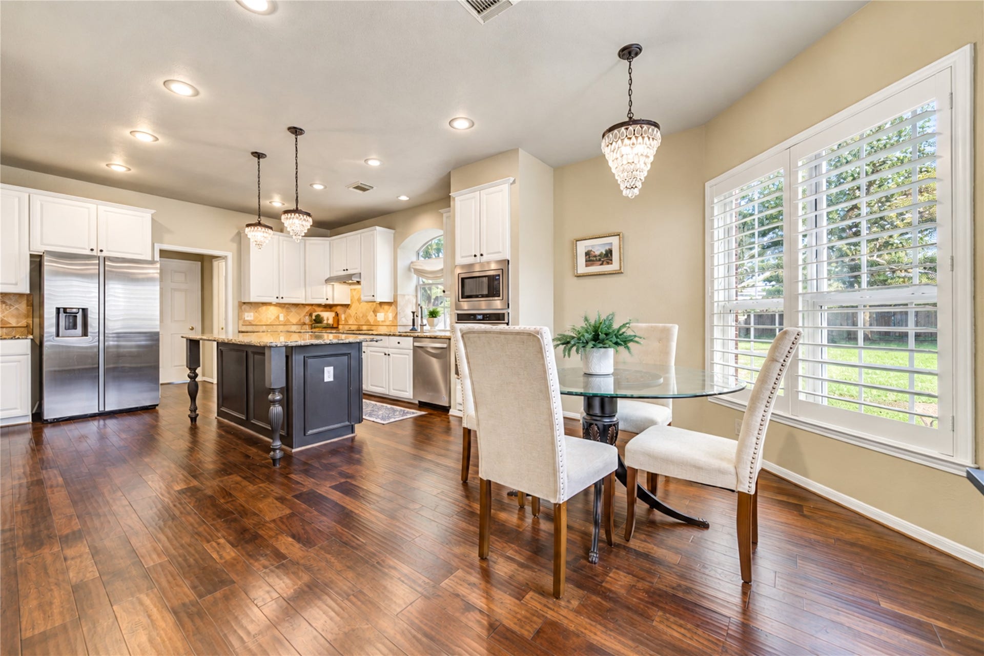 23338 Grand Springs Drive, Katy, TX 77494 The breakfast area boasts plantation shutters and a great view of the greenbelt. Greenway Village residents enjoy zoning to Cinco Ranch High School. Home of the Cougars!!