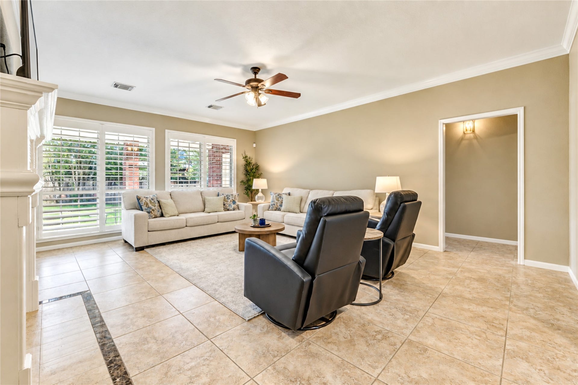 23338 Grand Springs Drive, Katy, TX 77494 Plantation shutters add a touch of elegance and energy efficiency to this lovely space.