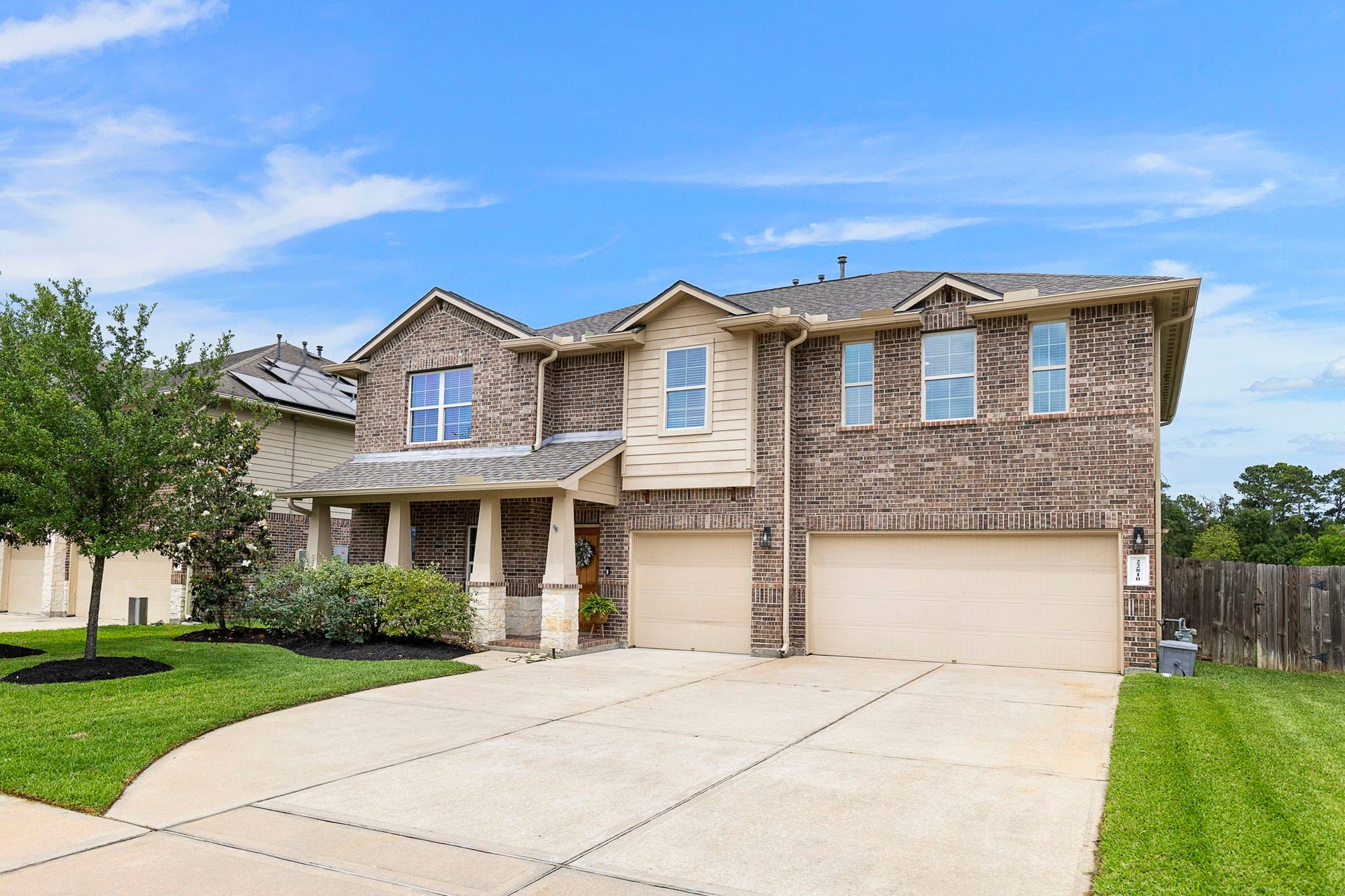 22810 Dale River Road, Tomball, TX 77375 Extra wide driveway for easy parking in addition to the oversized 3-car garage.