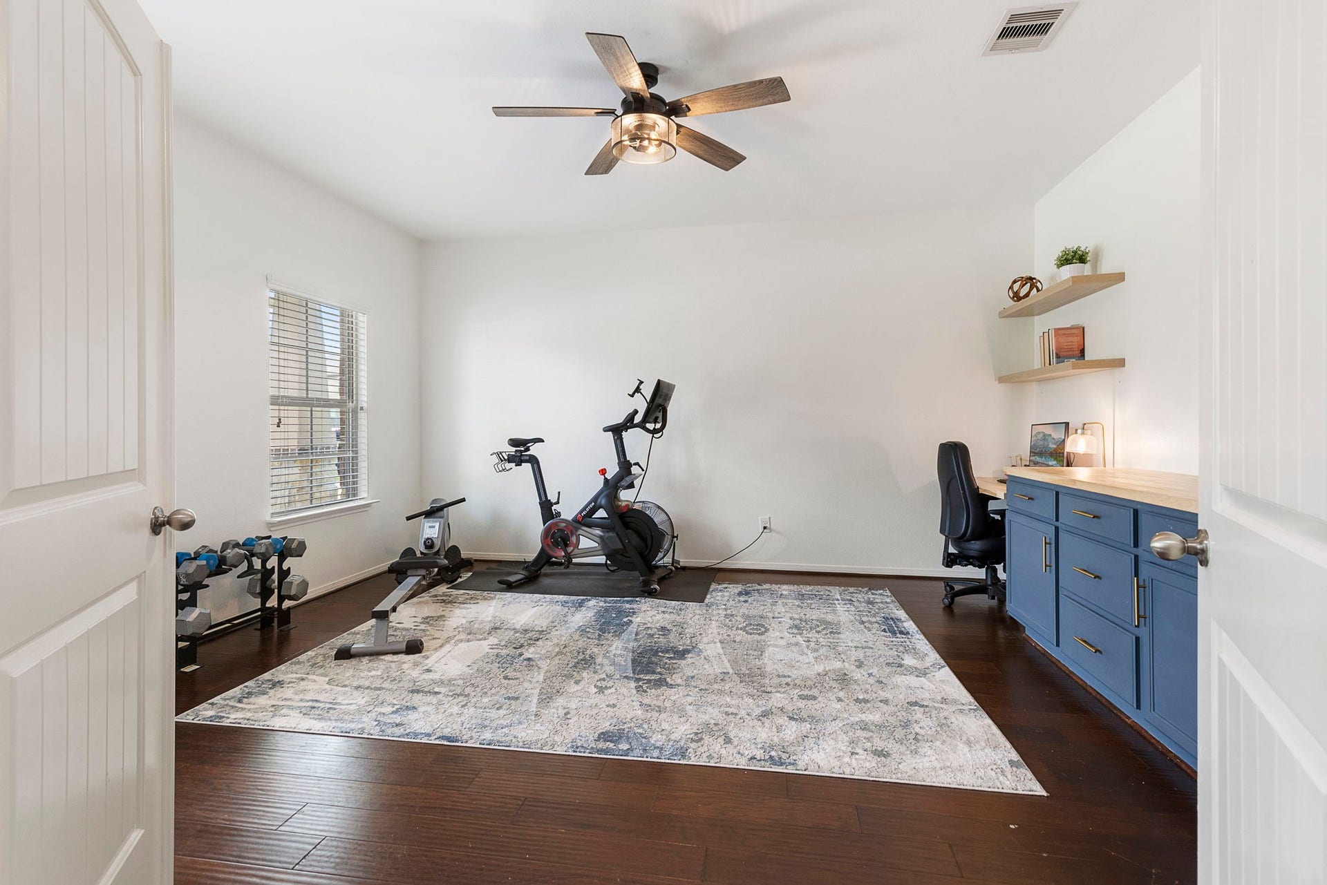 22810 Dale River Road, Tomball, TX 77375 French doors lead to this private study that is large enough to home both your office needs and workout equipment!