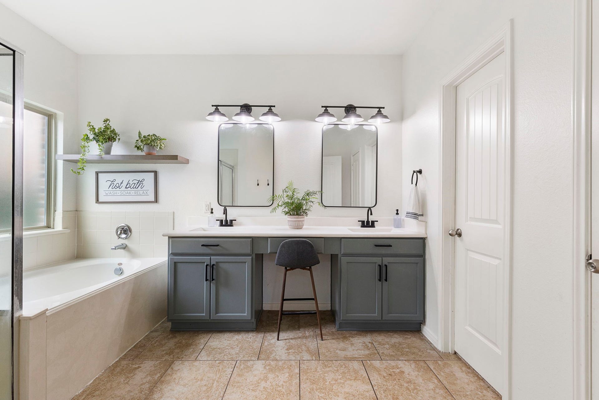 22810 Dale River Road, Tomball, TX 77375 Primary bathroom with double sinks and a huge walk-in closet.