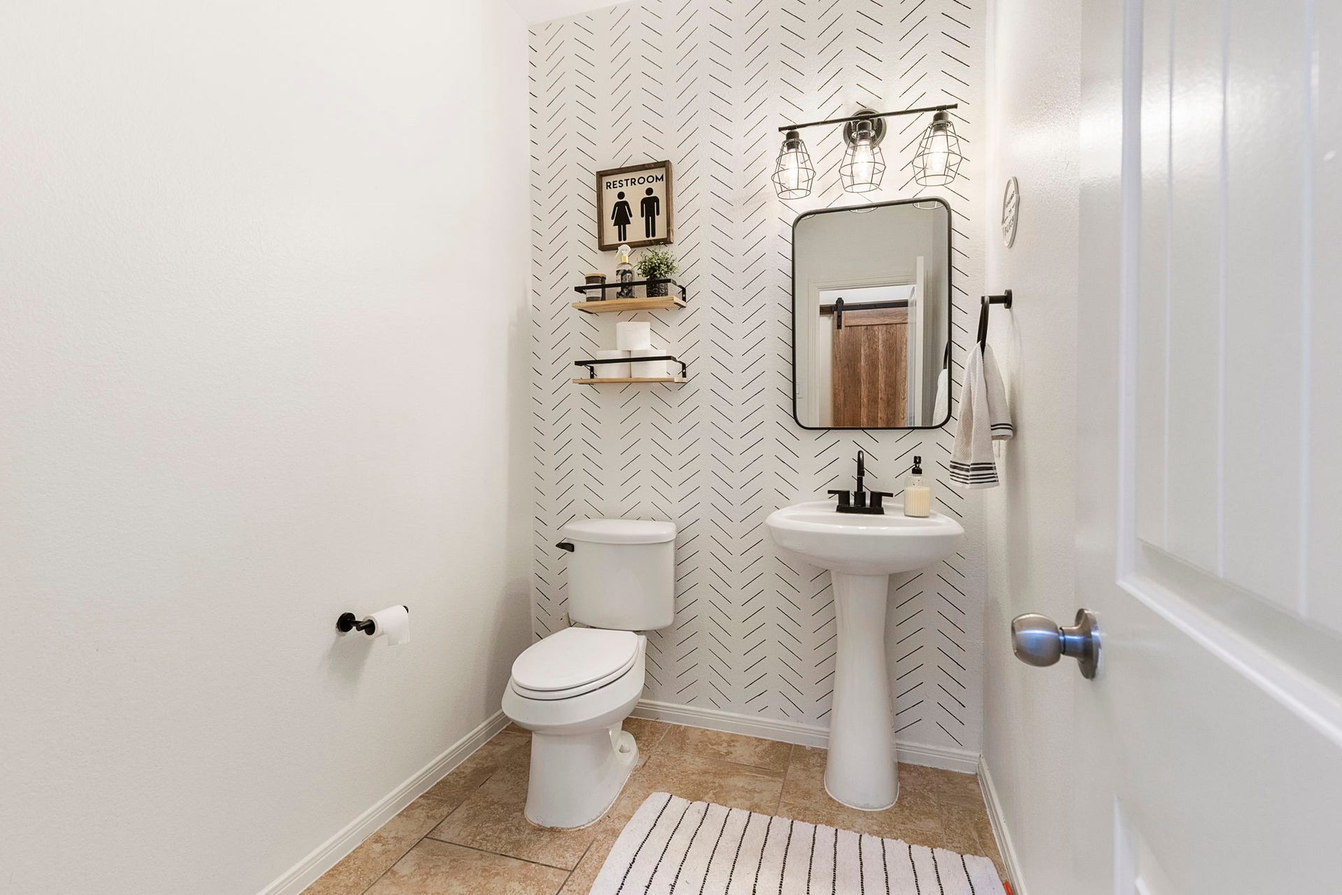 22810 Dale River Road, Tomball, TX 77375 Half bathroom downstairs.