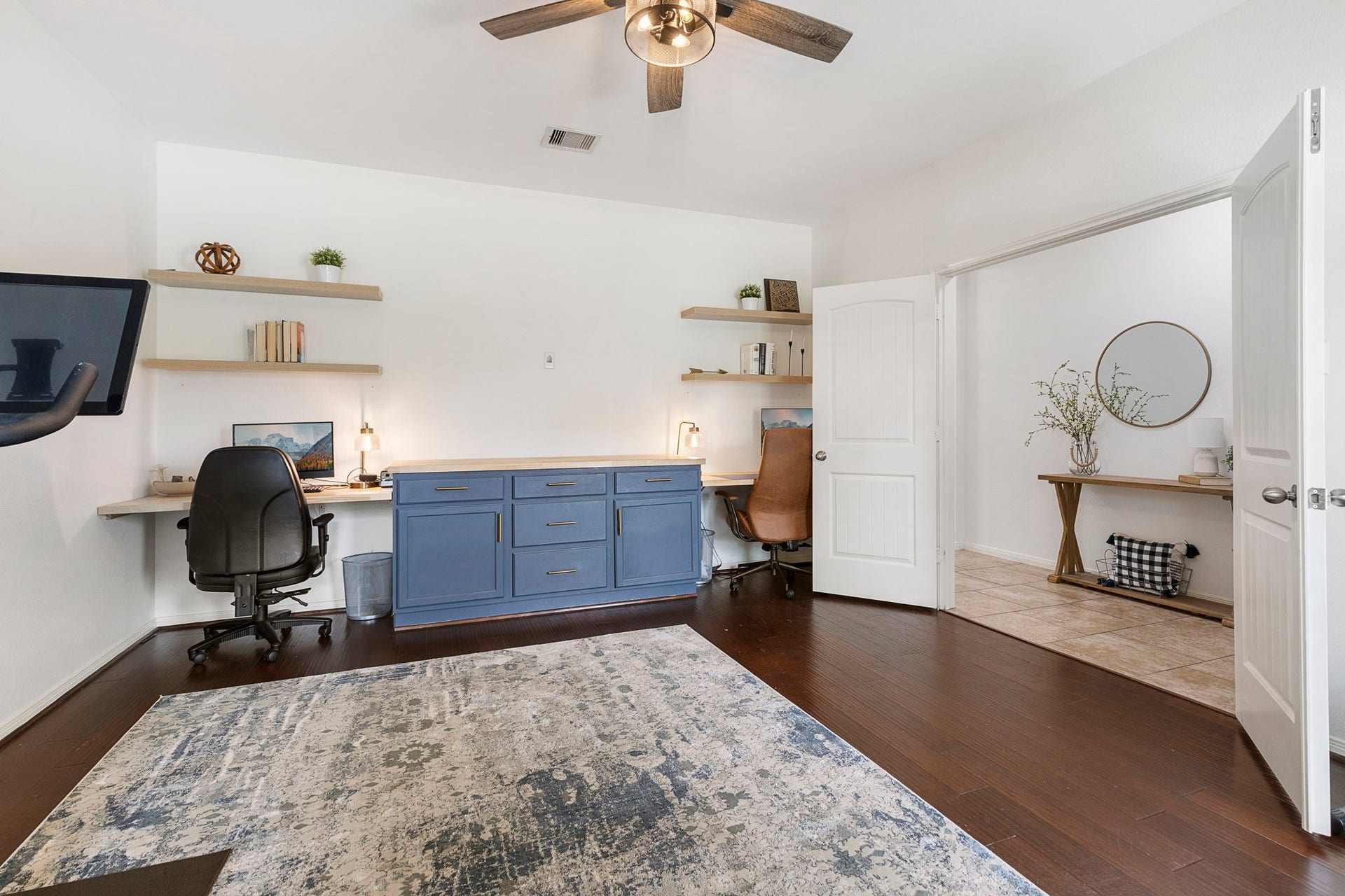 22810 Dale River Road, Tomball, TX 77375 Seller has upgraded the study to feature this dual desk built-in with center worktop and enclosed storage.