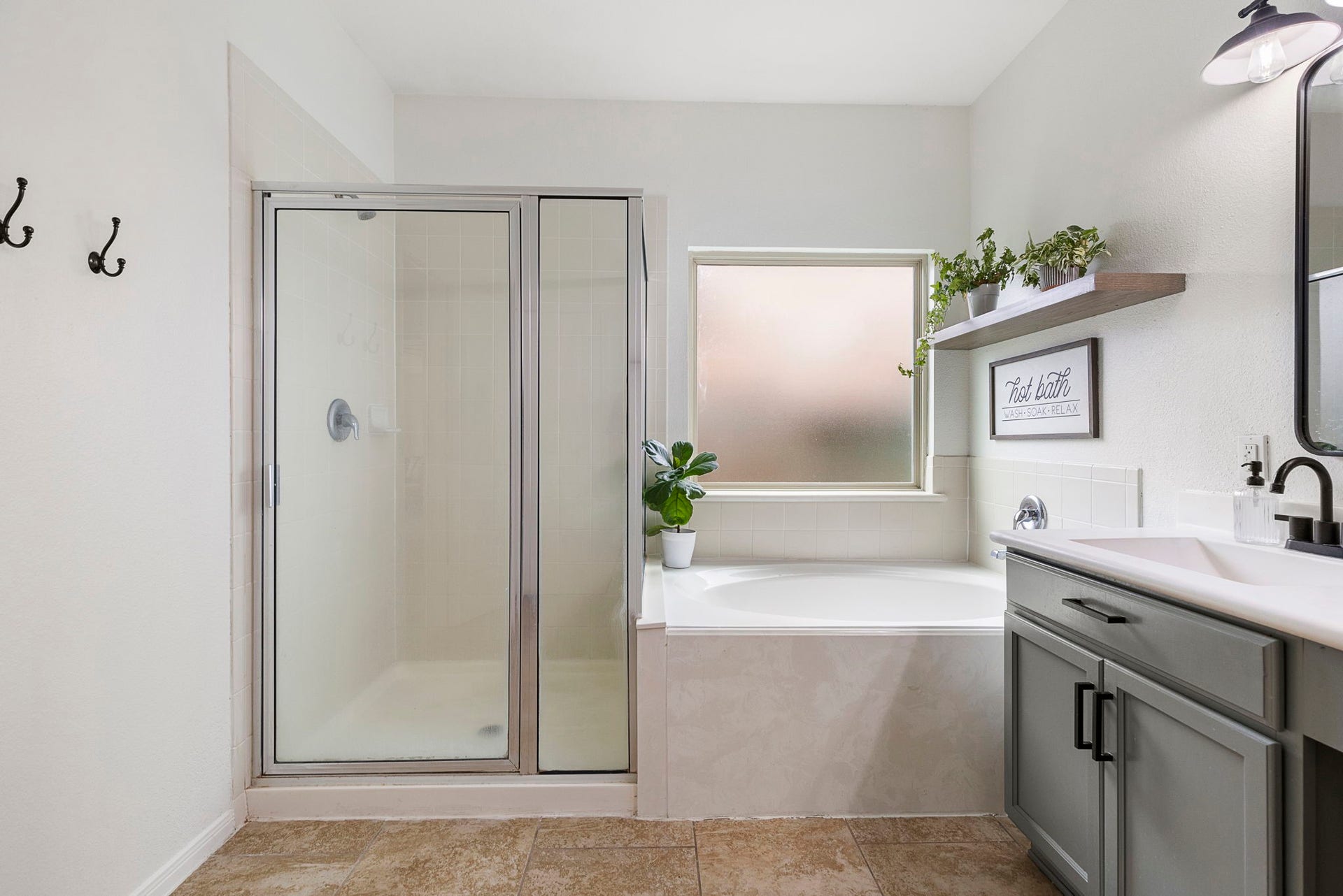 22810 Dale River Road, Tomball, TX 77375 Separate shower and nice soaking tub in the primary bathroom.